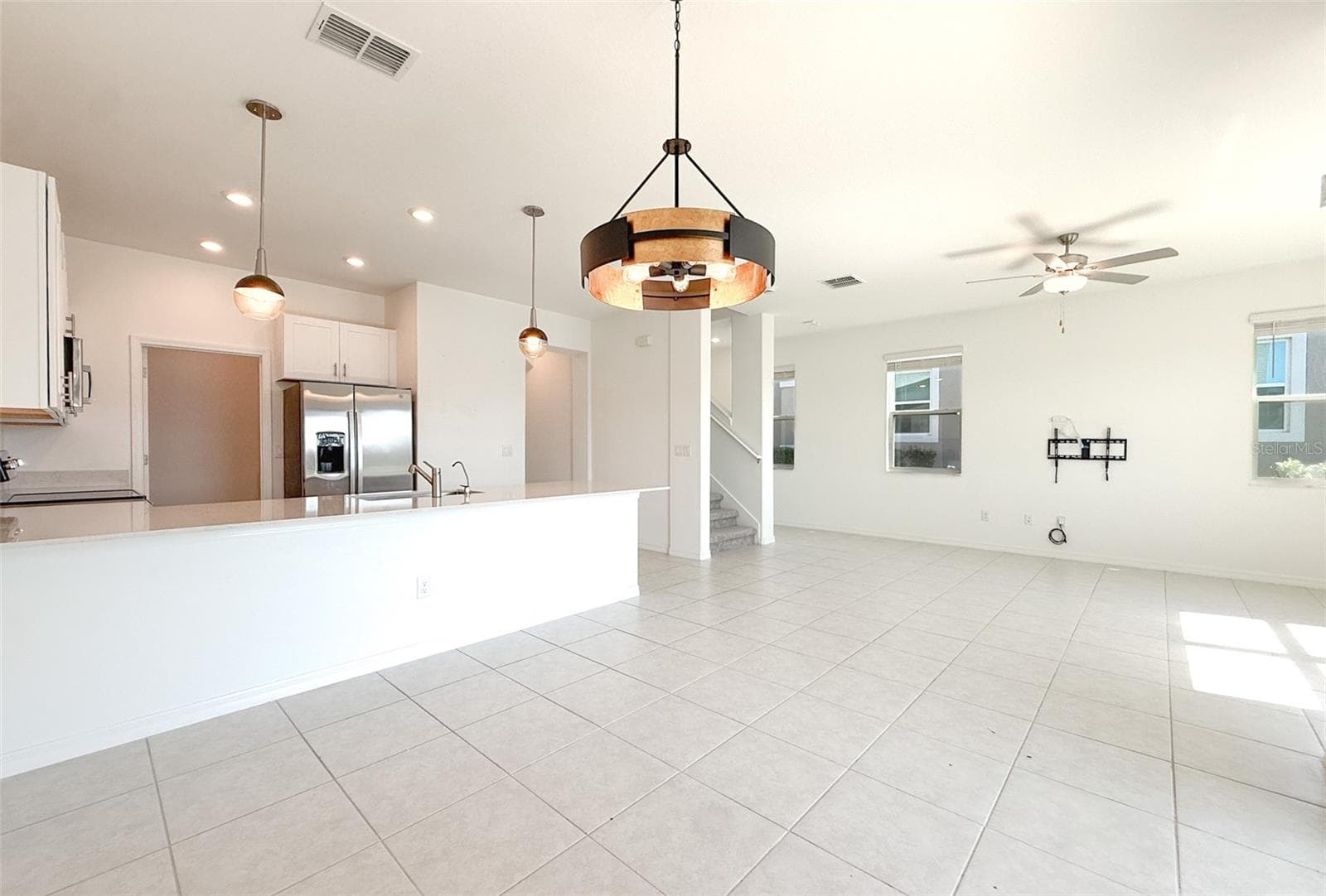 Living room & dining room & kitchen - 32106 POP ASH PL, SAN ANTONIO
