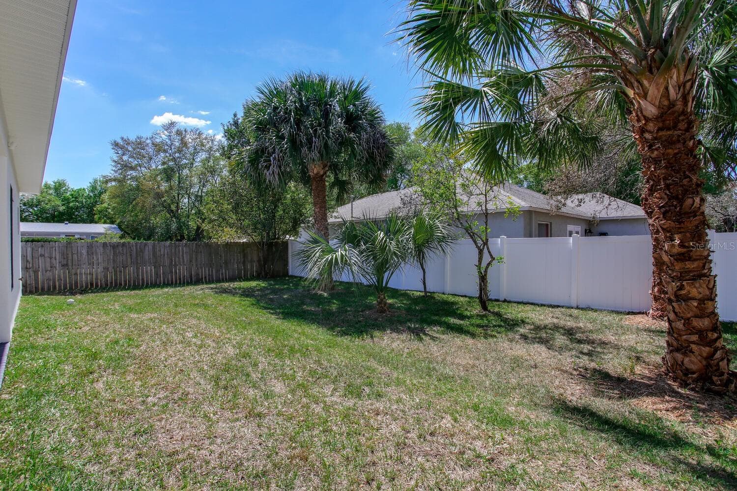 Backyard and covered patio - previously photographed. - 3040 BELCHER RD, DUNEDIN