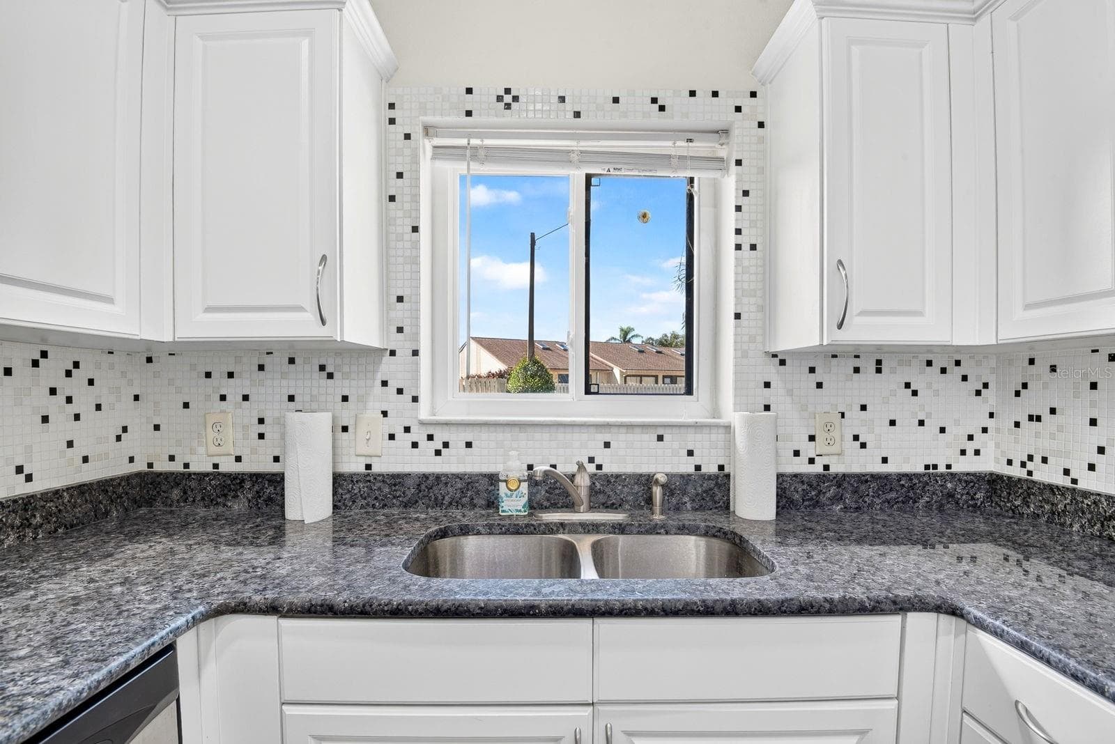 Kitchen overlooking a nice window outdoor view - 2930 64TH ST W #130, BRADENTON