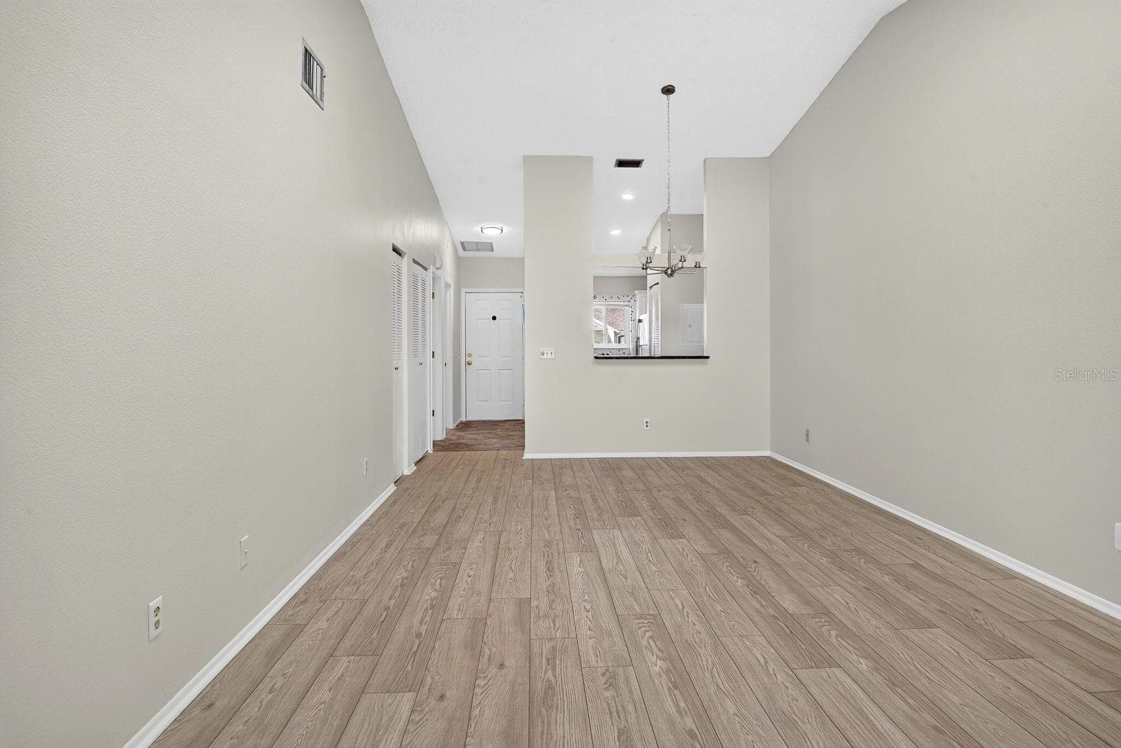 Facing into kitchen from living and dining area - 2930 64TH ST W #130, BRADENTON