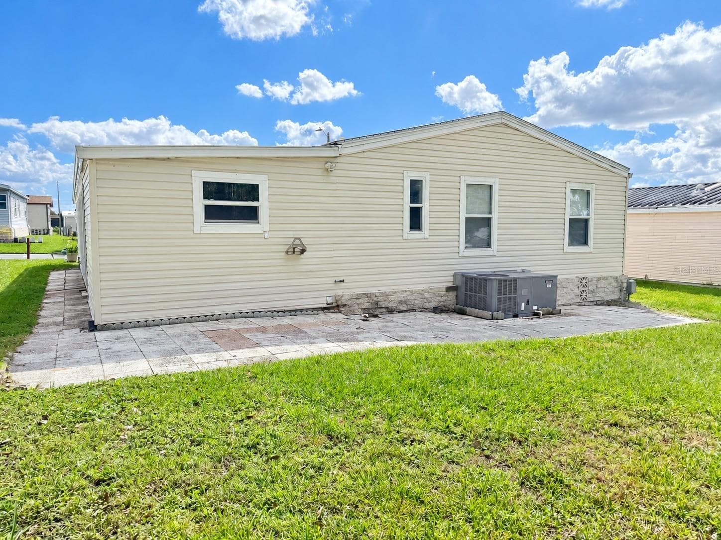 Back and Side View - 37631 CAMPO AVENUE, ZEPHYRHILLS