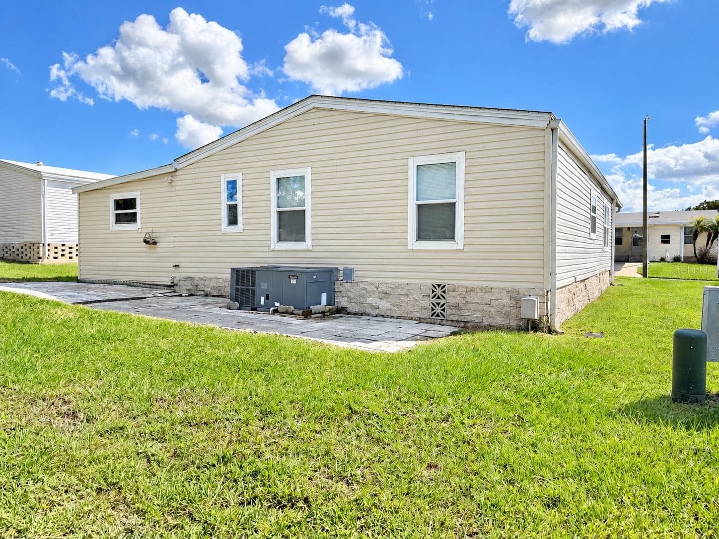 Back and Side View - 37631 CAMPO AVENUE, ZEPHYRHILLS