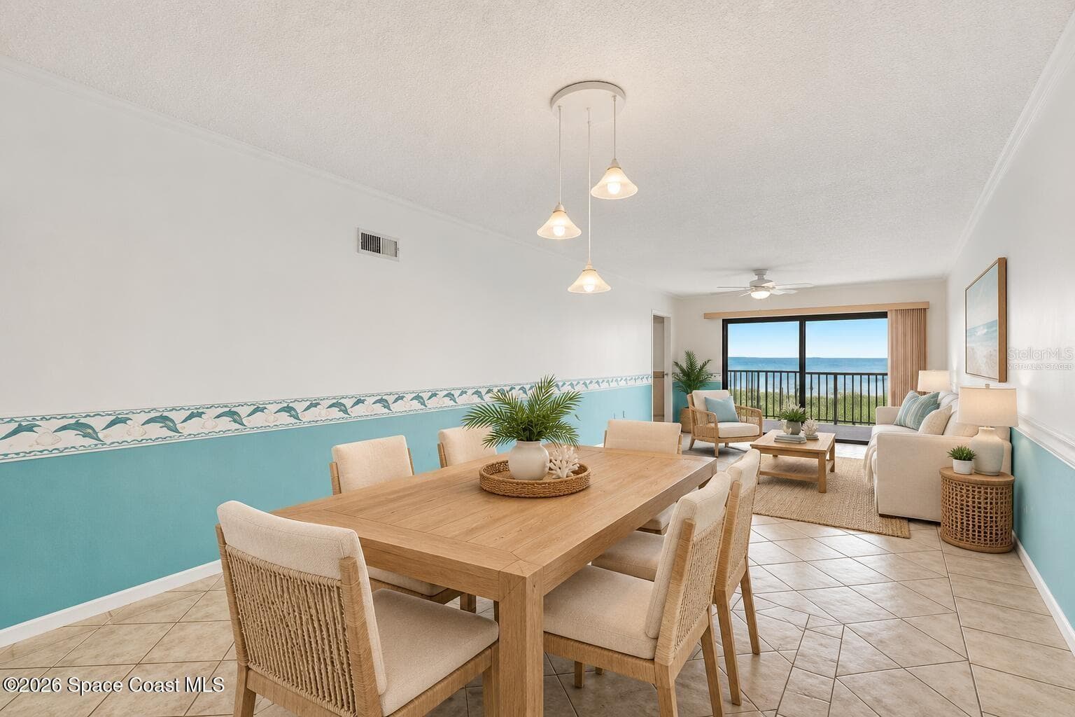 Virtually Staged Living & Dining Room - 8496 RIDGEWOOD AVE #3304, CAPE CANAVERAL