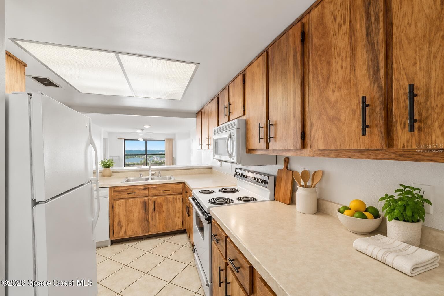 Virtually Staged Kitchen - 8496 RIDGEWOOD AVE #3304, CAPE CANAVERAL
