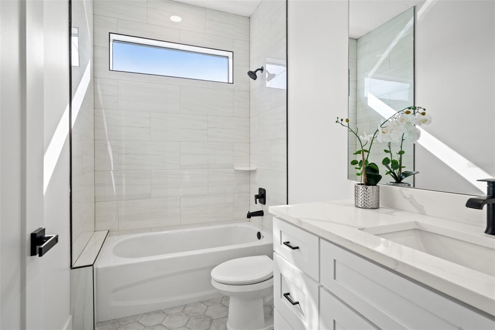 Bathroom in a completed model residence - 6209 64TH WAY N, PINELLAS PARK