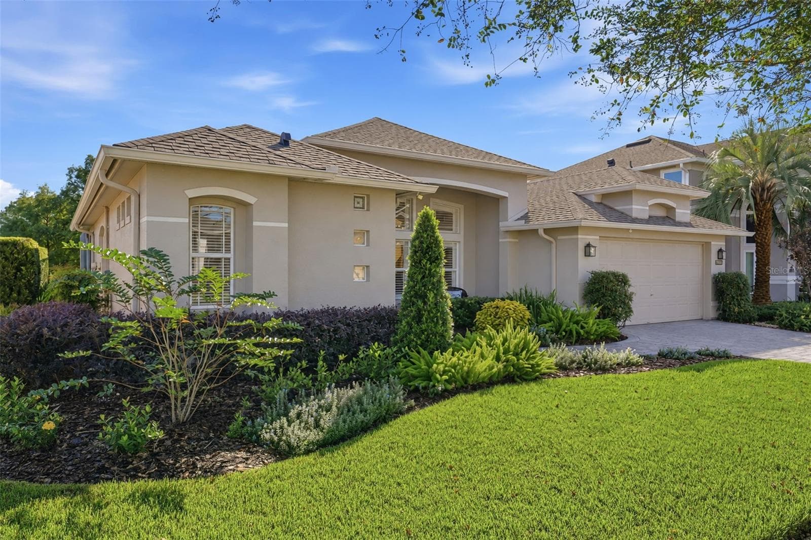 FRONT LEFT SIDE OF THE HOUSE - 13850 BLUEWATER CIR, ORLANDO