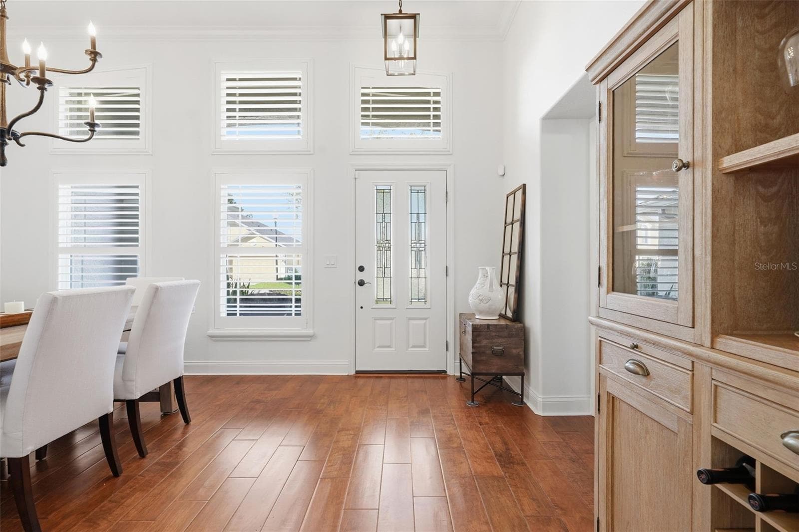 INSIDE FRONT THE FRONT DOOR WITH HIGH CEILINGS AND LOTS OF LIGHT - 13850 BLUEWATER CIR, ORLANDO