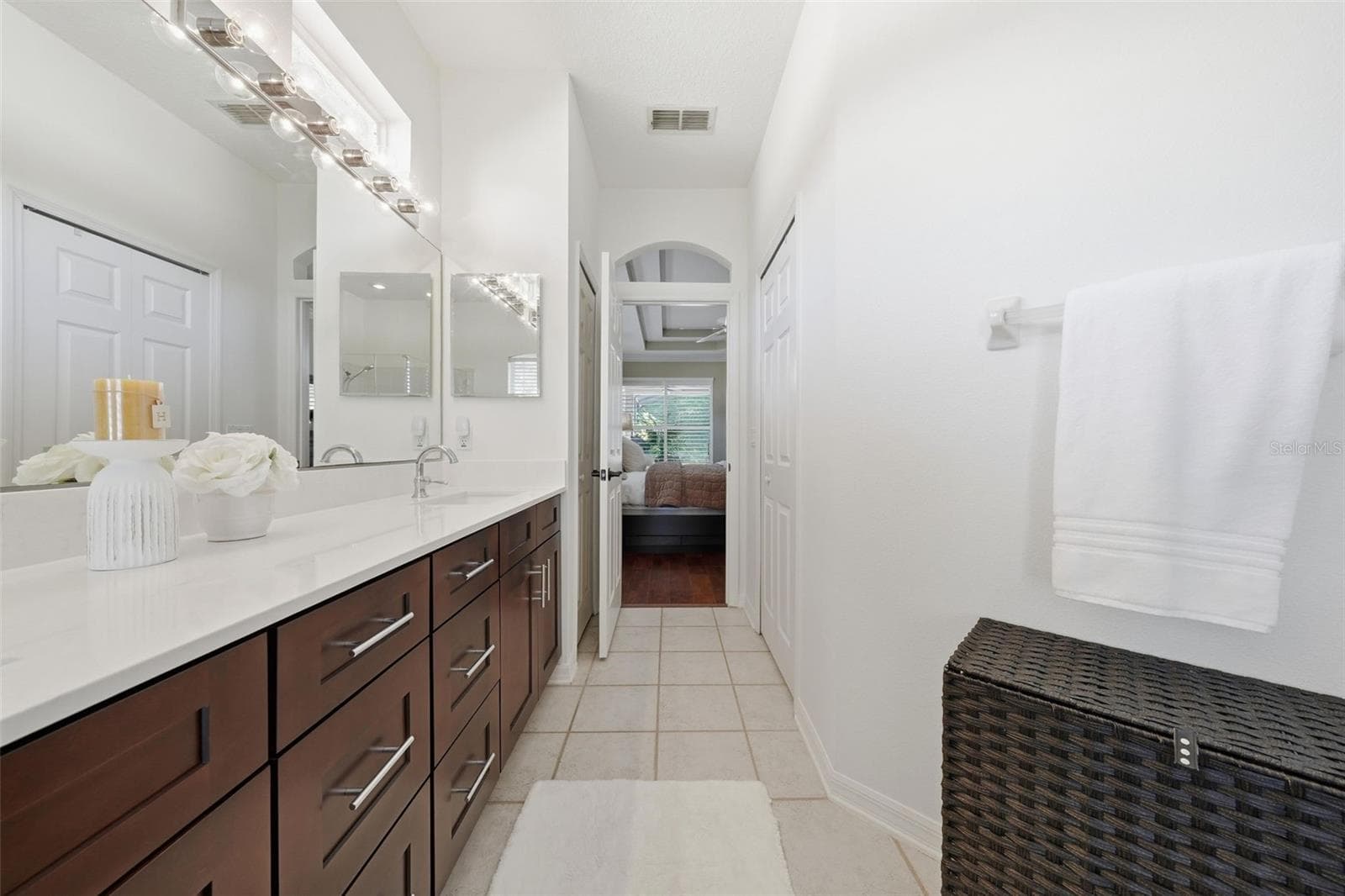 PRIMARY ENSUITE WITH NEW DOUBLE SINK VANITY WITH PLENTY OF STORAGE - 13850 BLUEWATER CIR, ORLANDO