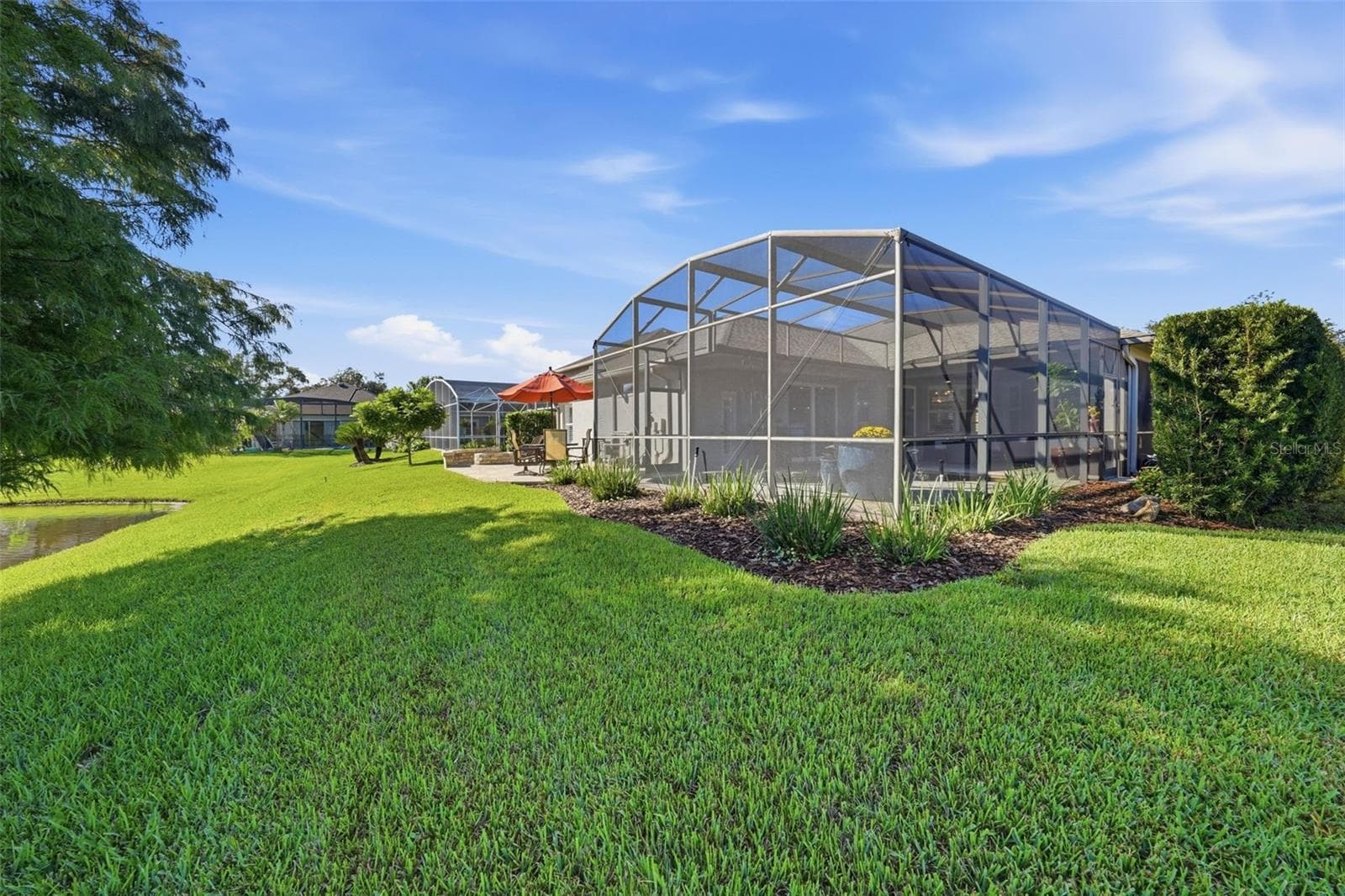 BACK YARD RIGHT VIEW - 13850 BLUEWATER CIR, ORLANDO