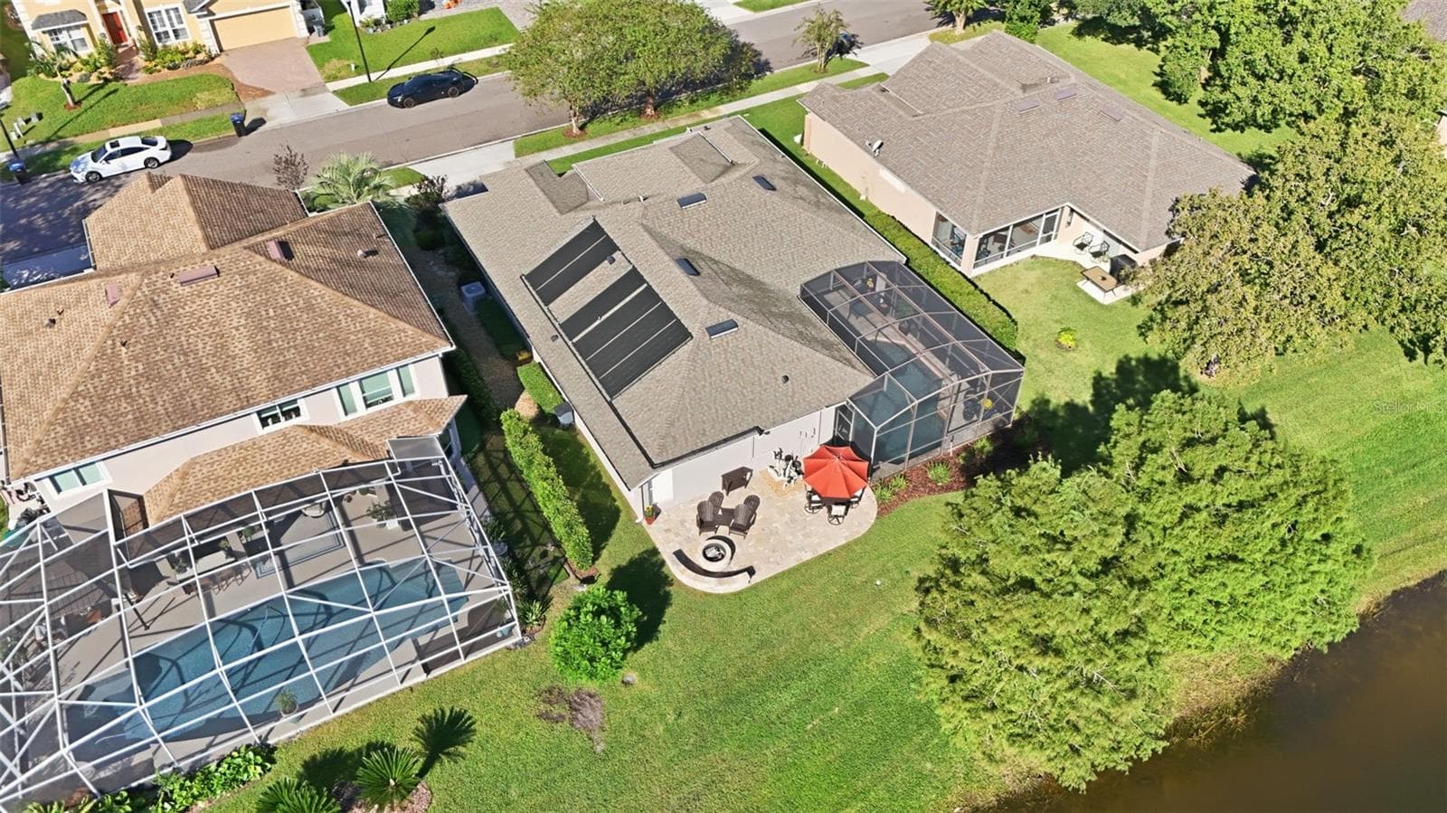 SOLAR PANELS TO HEAT THE POOL - 13850 BLUEWATER CIR, ORLANDO