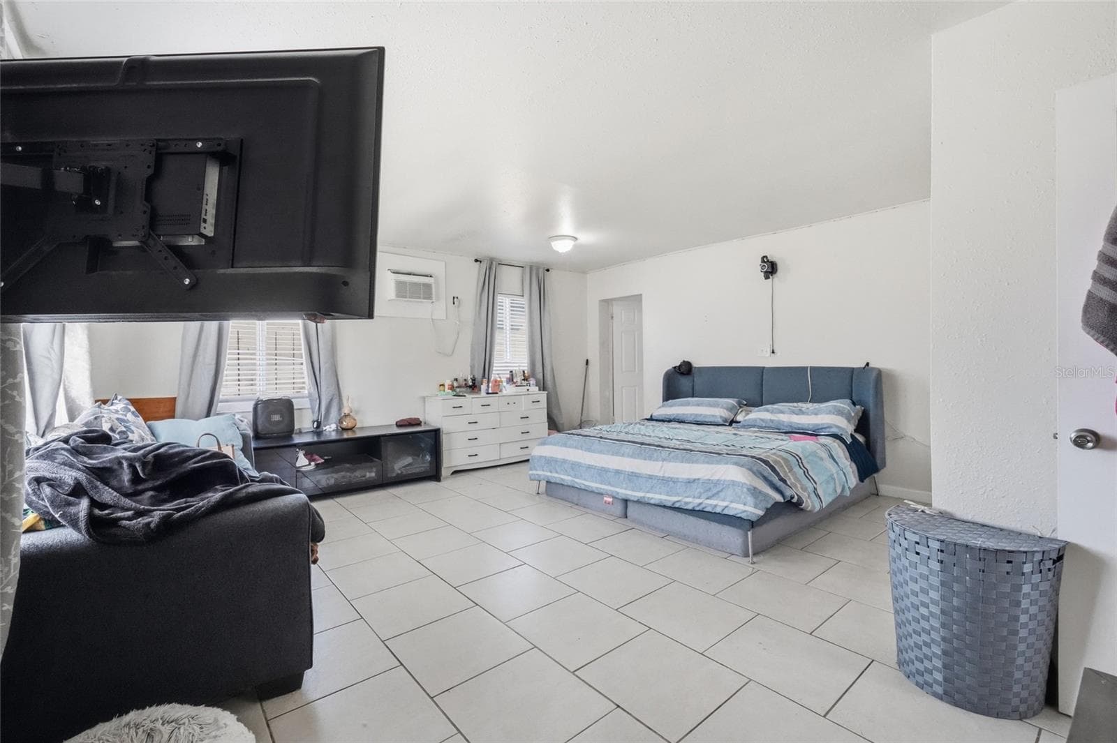 Primary bedroom 2420 with 1/2 bath and laundry - 2418 51ST AVENUE DR W, BRADENTON