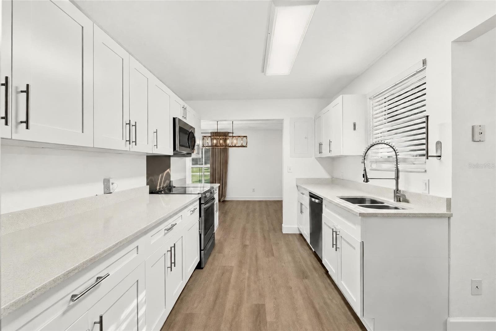 Kitchen to Dining Room - 1333 SE 3RD ST, OCALA