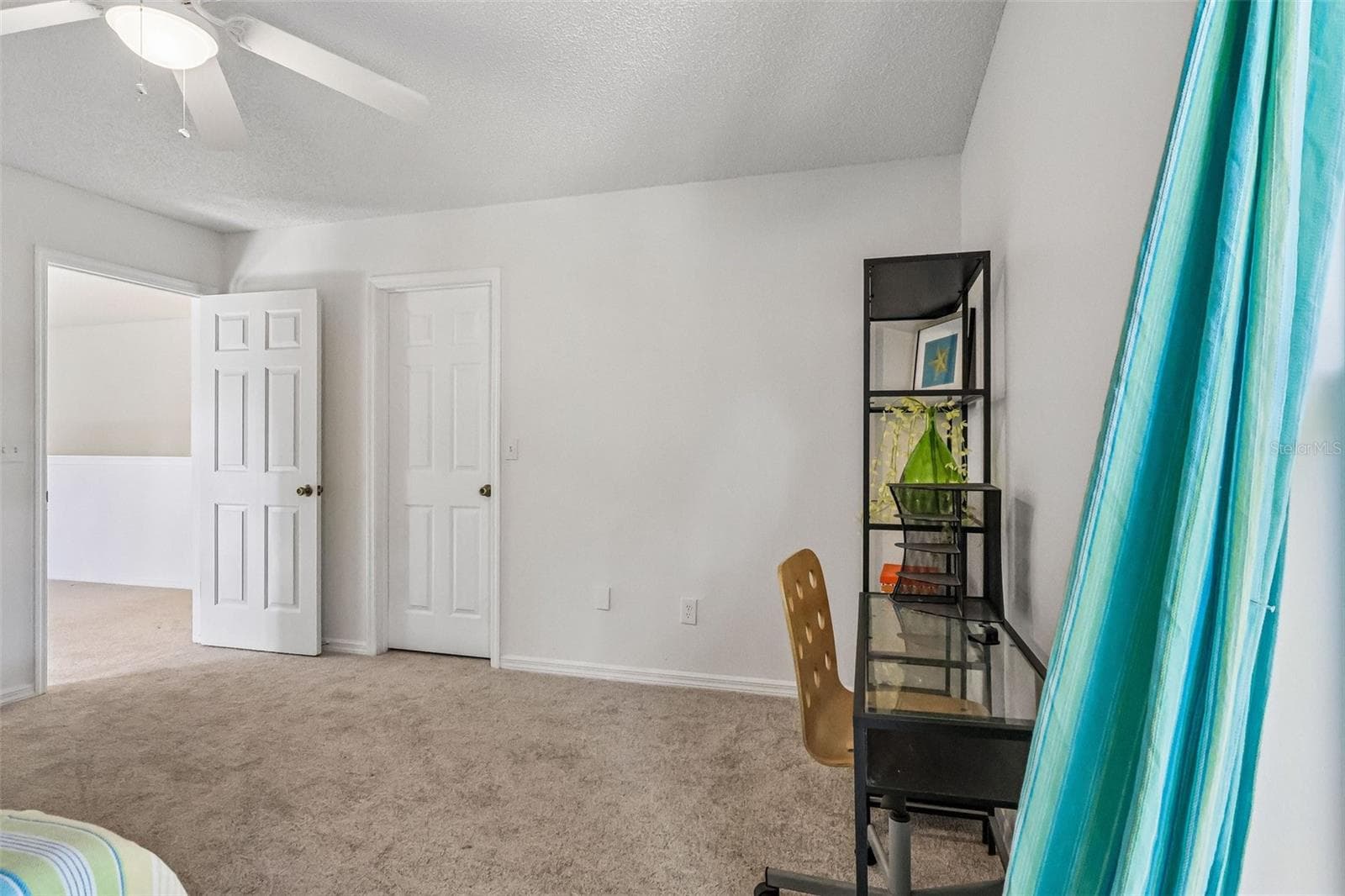3 of 4 total bedrooms upstairs -- one at each corner of the house. - 1305 WINDY BLUFF DR, MINNEOLA