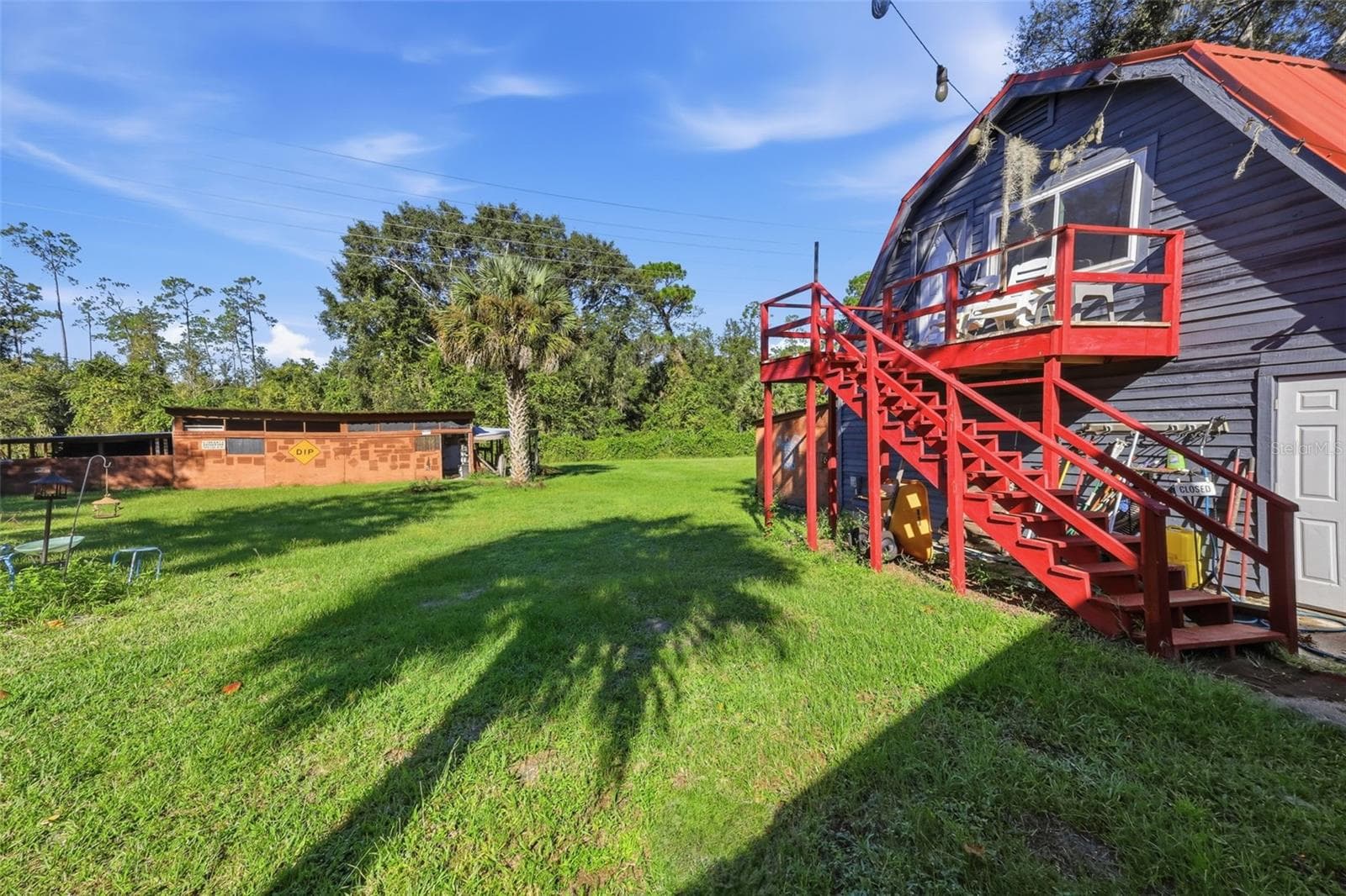 DETACHED GARAGE W/LIVING QUARTERS UP TOP - 2290 MUD LAKE RD, DE LEON SPRINGS