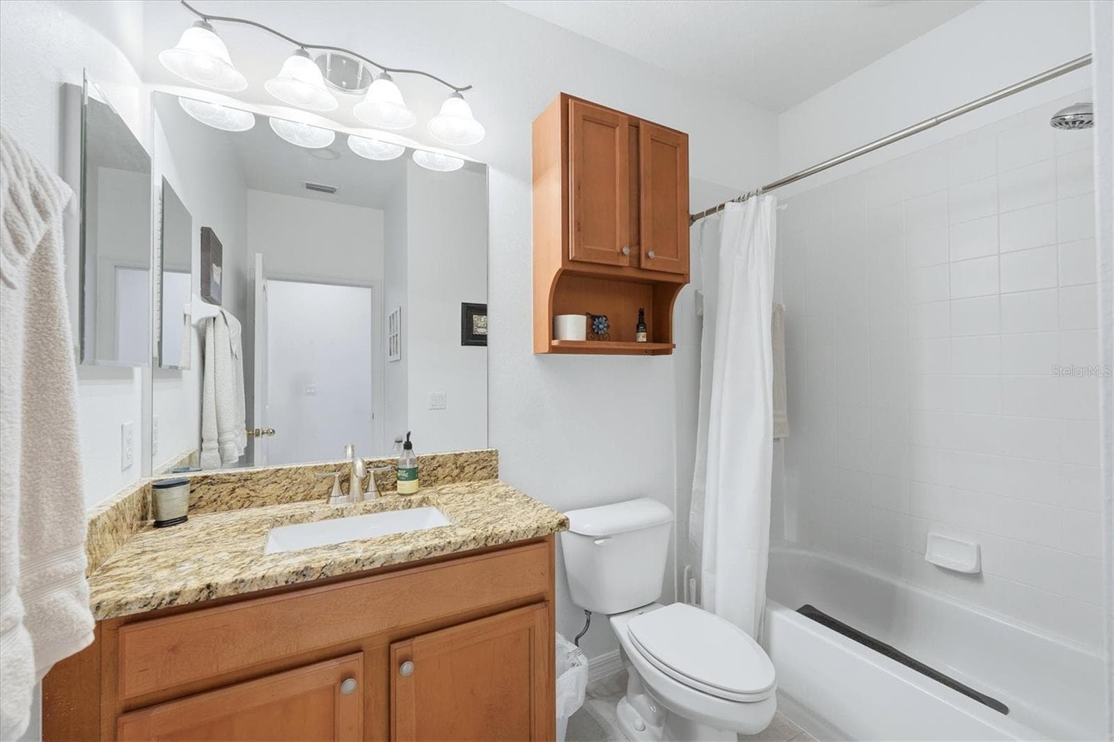 Full bathroom off the hallway - 1153 JONAH DR, NORTH PORT
