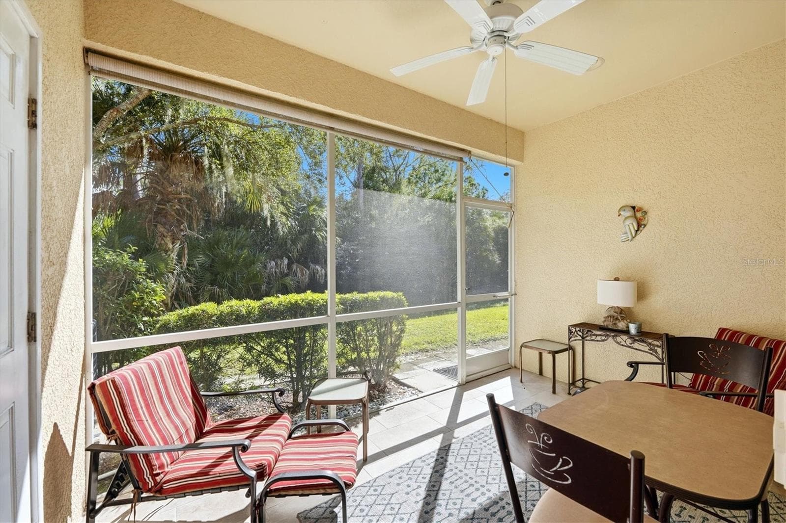 Covered lanai with tile floor. - 1153 JONAH DR, NORTH PORT