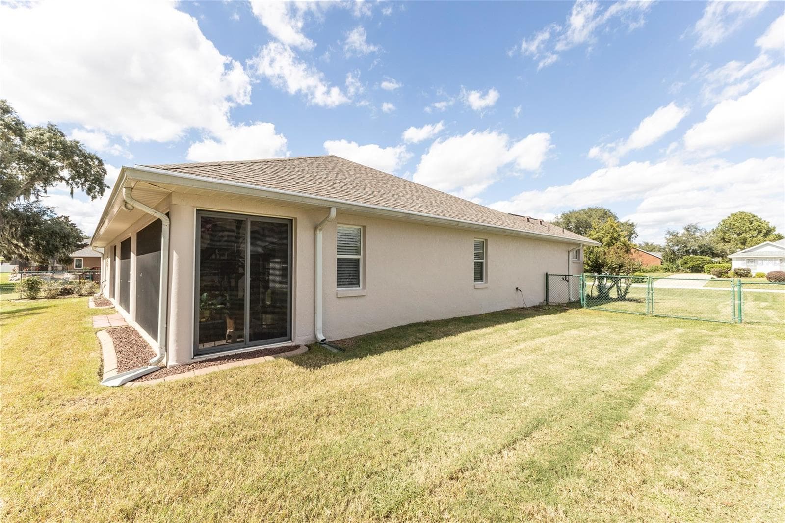 Side yard - 5399 COUNTY ROAD 125, WILDWOOD