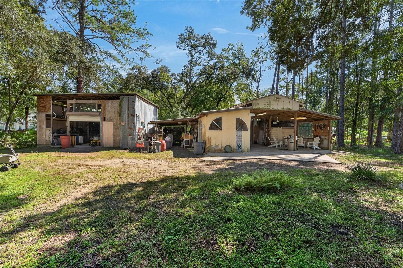 Out buildings that can be shop, storage or barn. Livestock are welcome here. - 28329 LINDENHURST DR, WESLEY CHAPEL