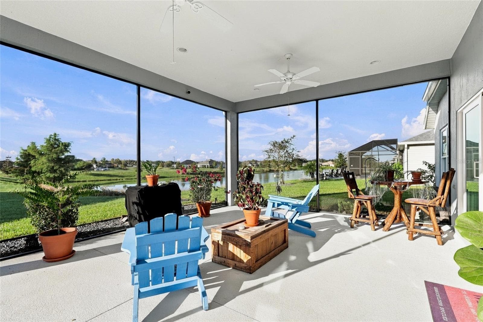 Lanai with Pond View - 614 LAKE CREEK CIR, THE VILLAGES