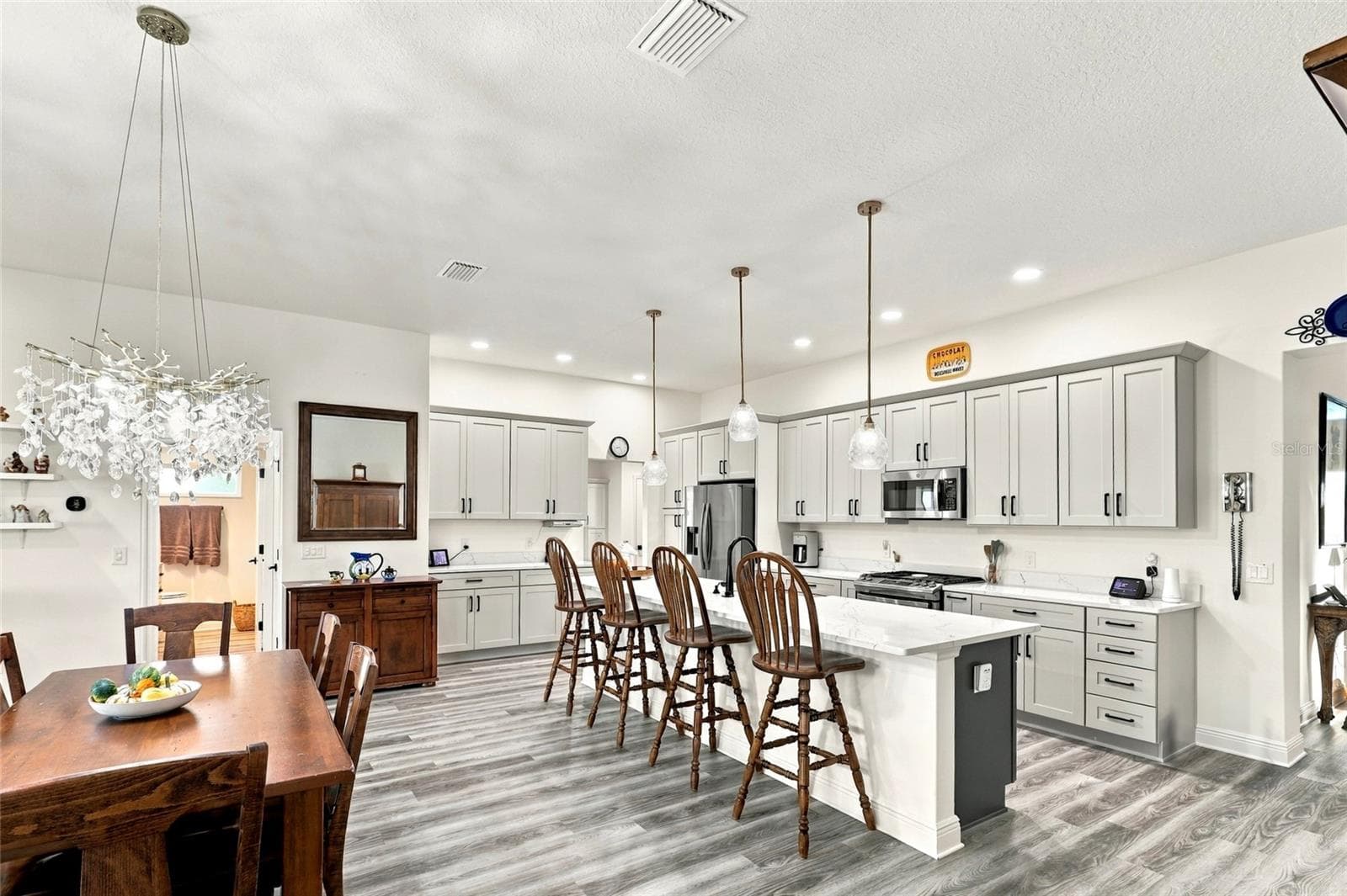 Dining Room & Kitchen - 614 LAKE CREEK CIR, THE VILLAGES