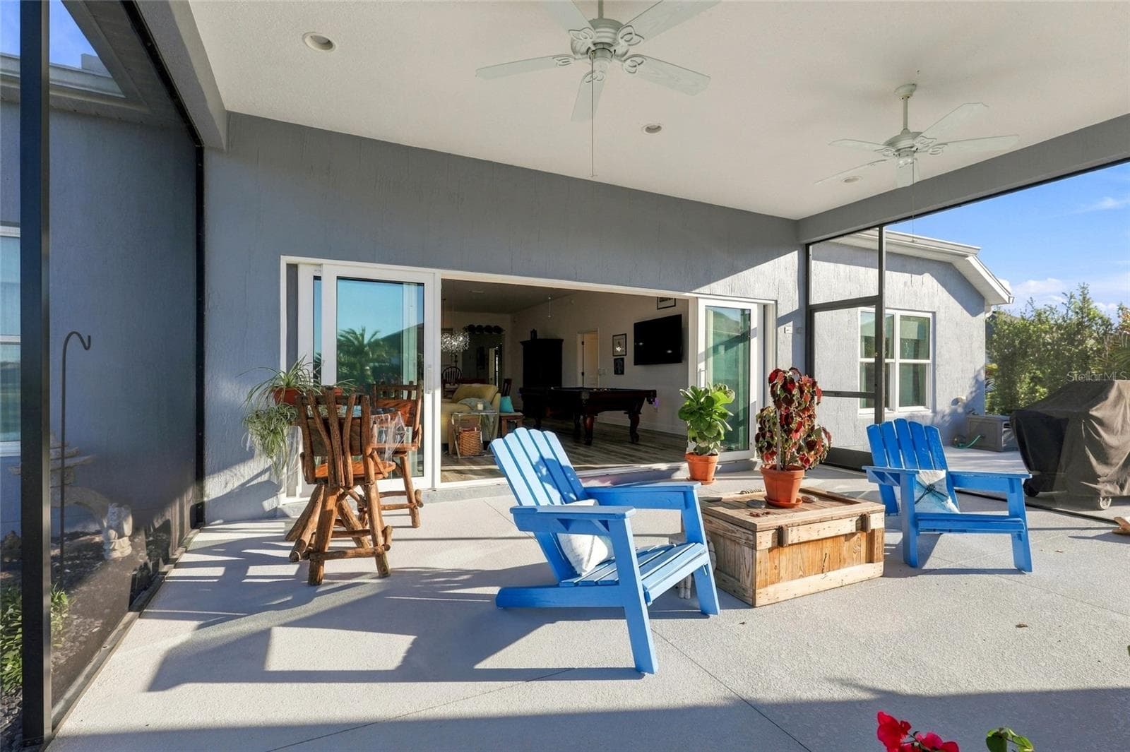 Lanai toward House - 614 LAKE CREEK CIR, THE VILLAGES