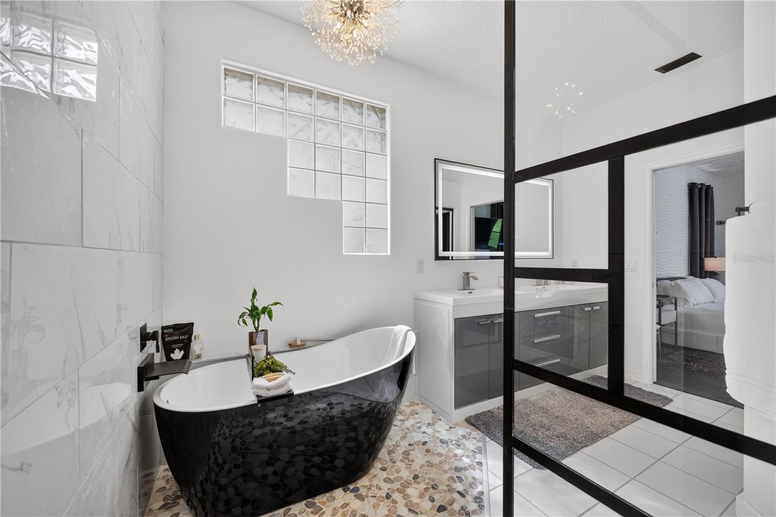 The star of the primary bathroom is a luxurious soaking tub. - 1854 VISTA ROYALE BLVD, ORLANDO