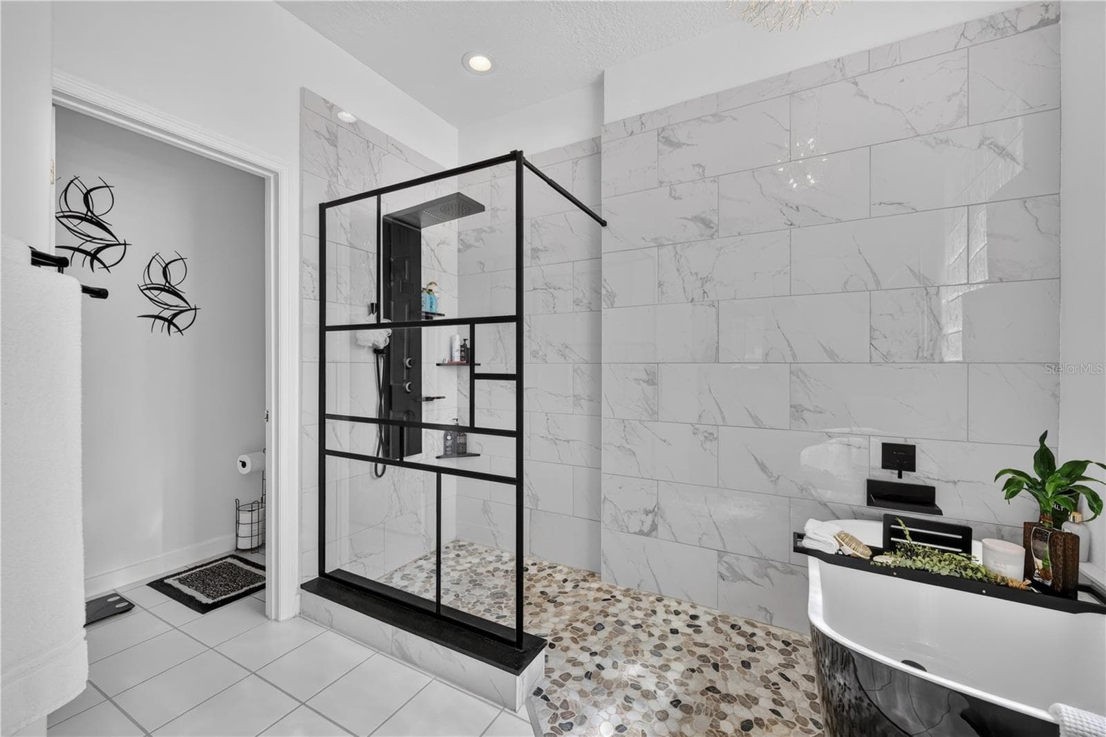 This shower enclosure is as beautiful as it is functional. - 1854 VISTA ROYALE BLVD, ORLANDO