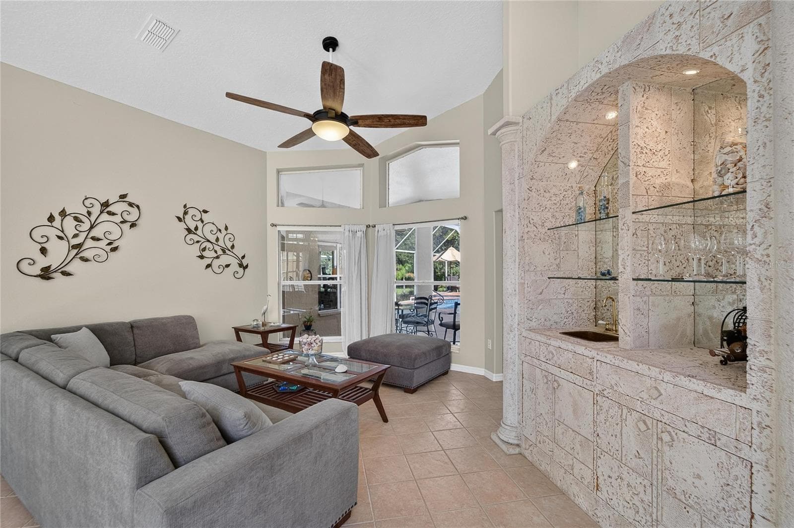Formal living room looks over the pool - 0 OLCOTT DR, WESLEY CHAPEL