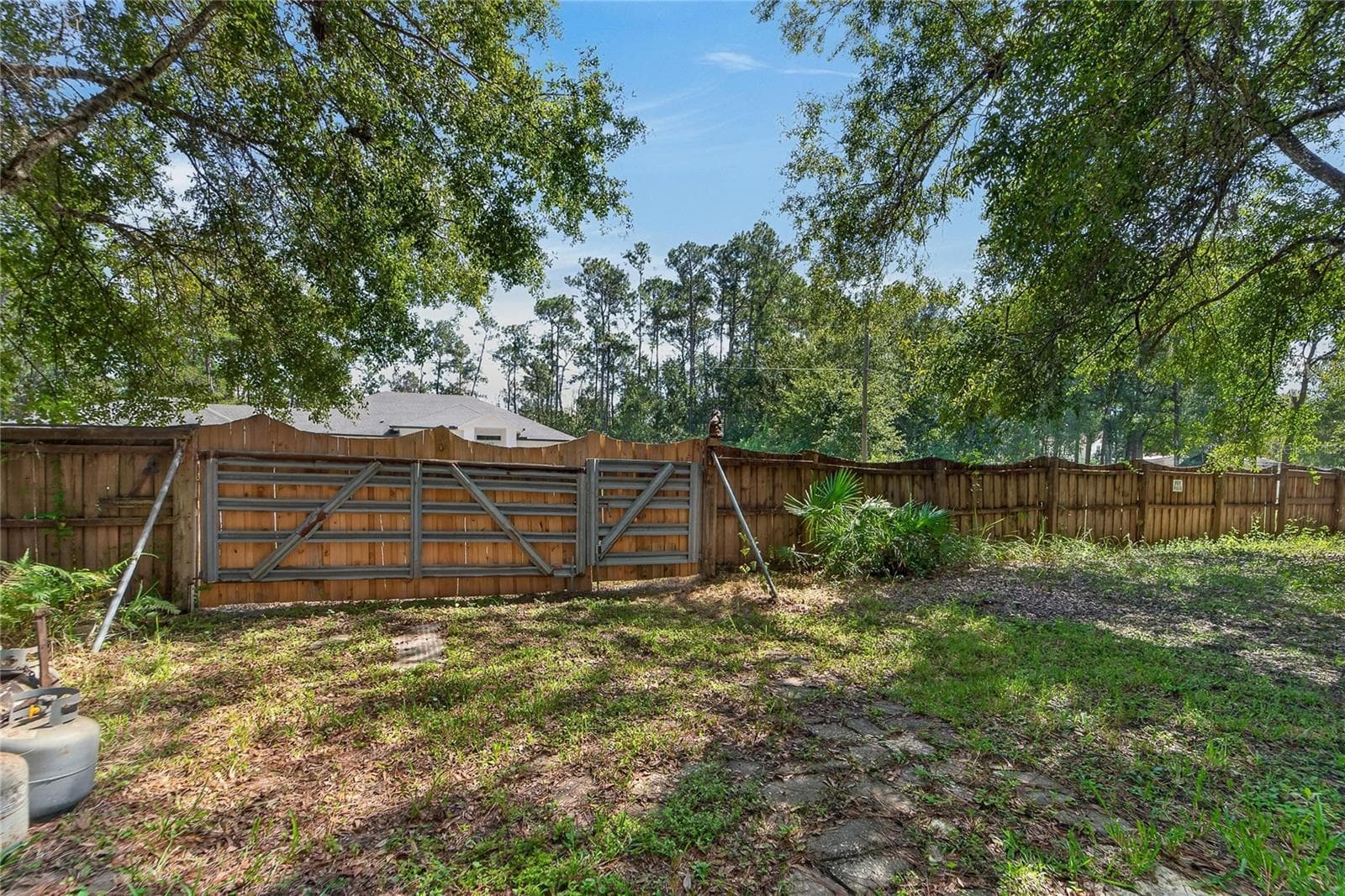 Wooden Fence with gate on Olcott Drive - 0 OLCOTT DR, WESLEY CHAPEL