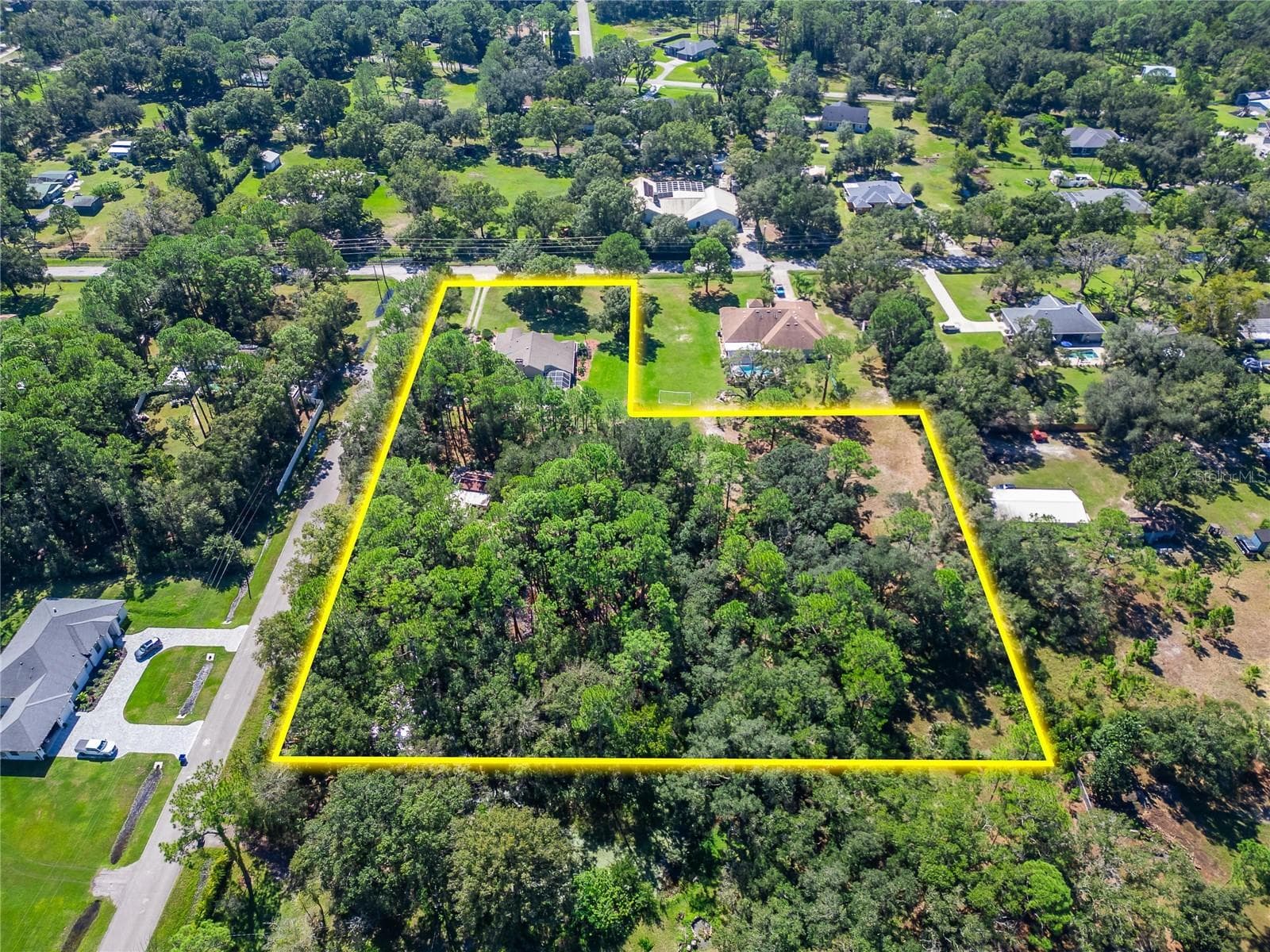3.66 Acres with entrances on Olcott Dr and Lindenhurst. - 0 LINDENHURST DR, WESLEY CHAPEL