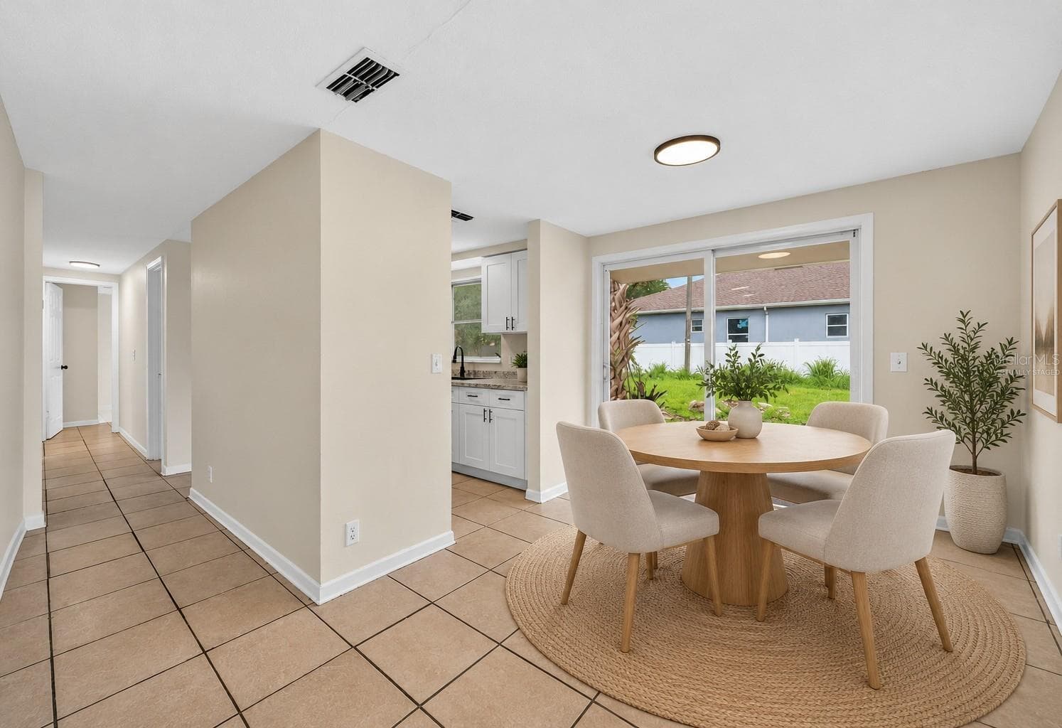 Virtually Staged - Dining Area - 3311 E CHELSEA ST, TAMPA