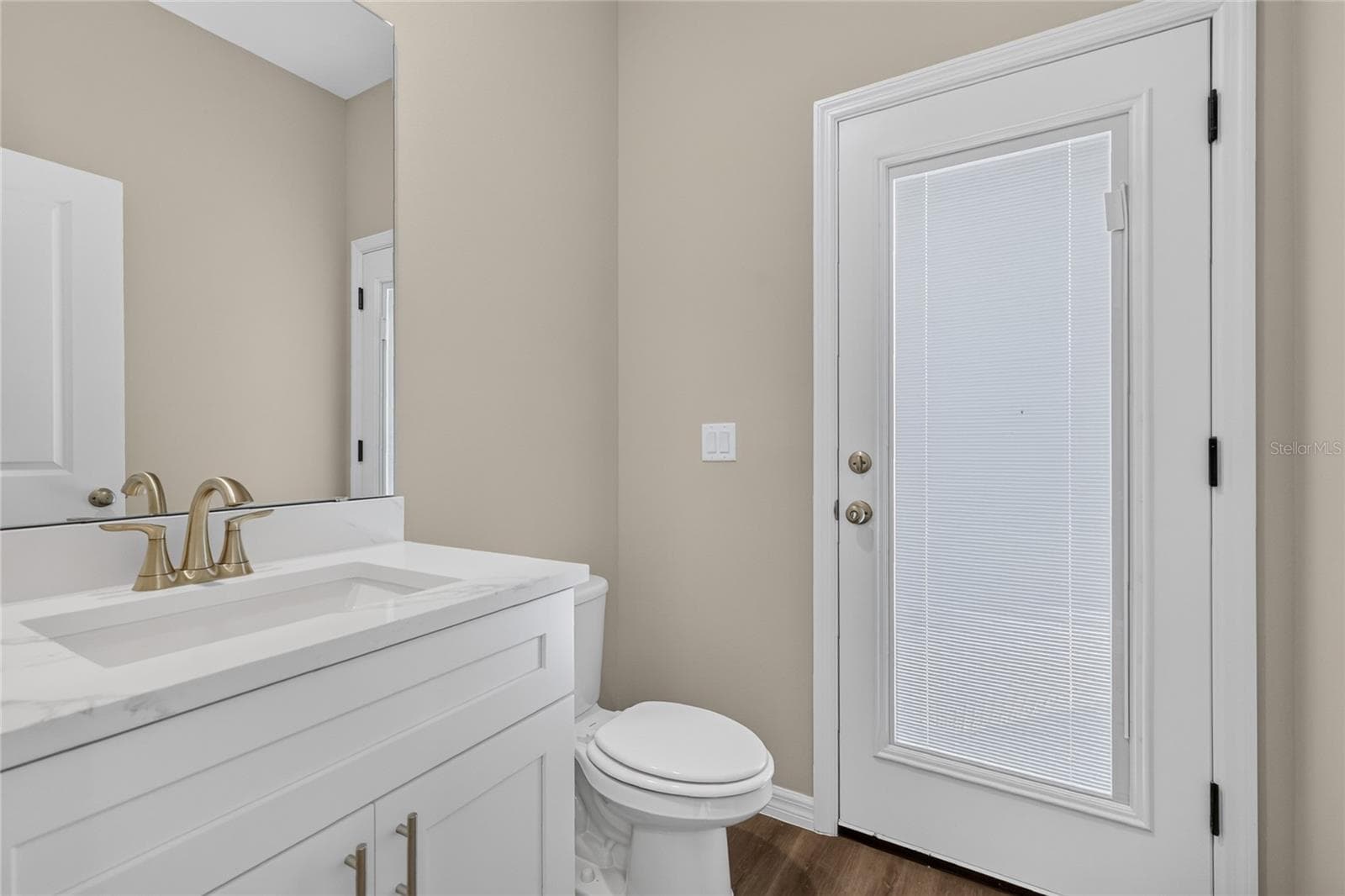 Half bath leads to back porch - 41428 ROYAL TRAILS RD, EUSTIS
