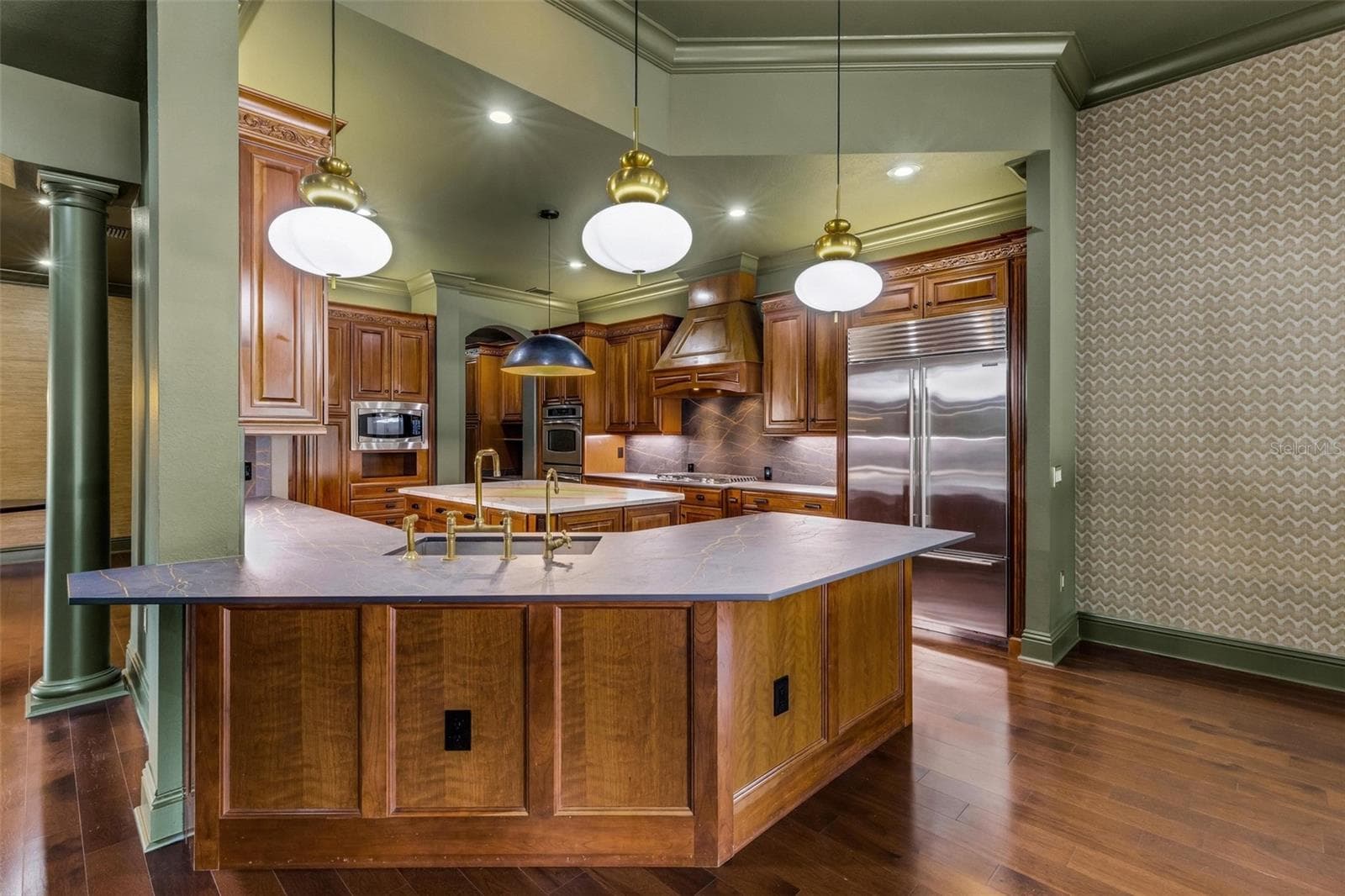 The custom Dekton countertops are made by Cosentino that blends minerals used in glass, porcelain and quartz forming an ultra durable material that is resistant to heat water, stains, UV light, and scratches and will withstand whatever you throw its way!! - 2734 BELLERIVE DR, LAKELAND