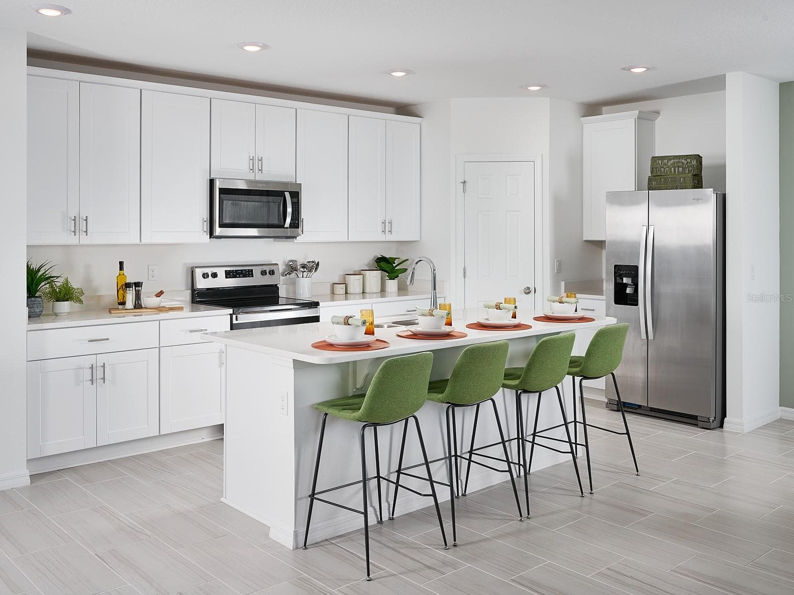 Photo is not of the actual home, but is an inspirational photo of builder’s model home and may depict options, furnishings, and/or decorator features that are not included. - 2041 ROSEWOOD DR, BARTOW