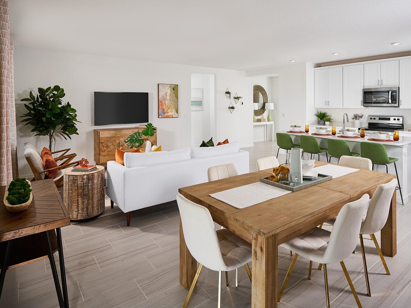 Photo is not of the actual home, but is an inspirational photo of builder’s model home and may depict options, furnishings, and/or decorator features that are not included. - 2041 ROSEWOOD DR, BARTOW