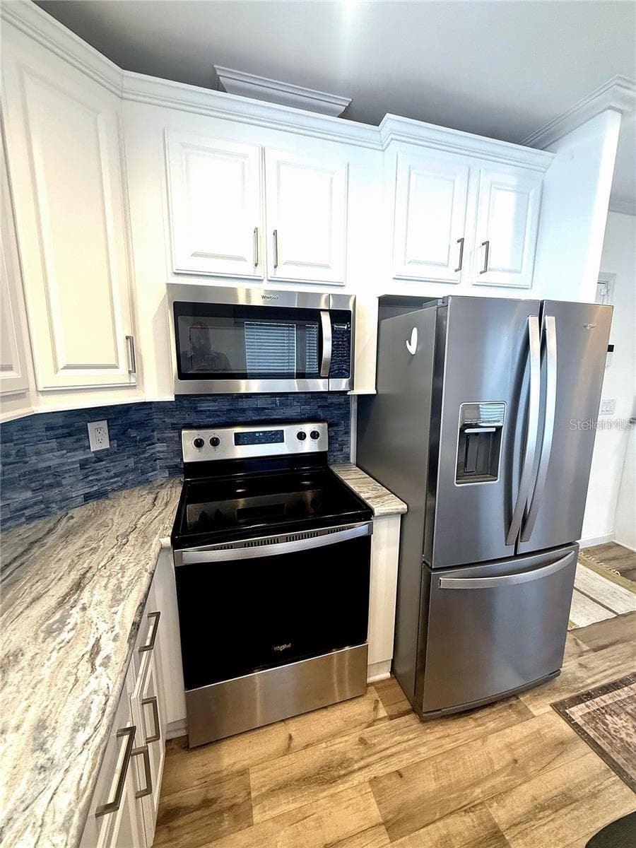 Manufactured Home at 7060 FAIRVIEW VILLAGE CIR, WINTER HAVEN, photo 12 of 44