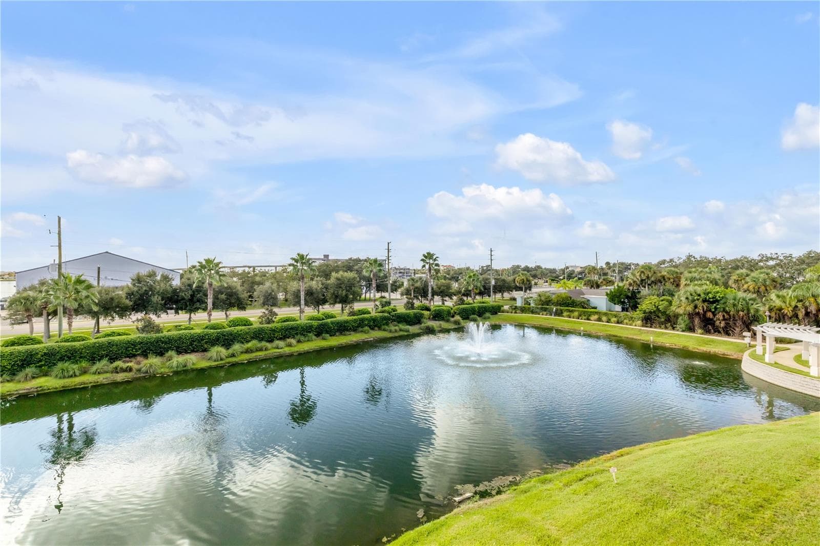 Back patio pond view and Marina - 1 RIVERWALK DR #303, NEW SMYRNA BEACH