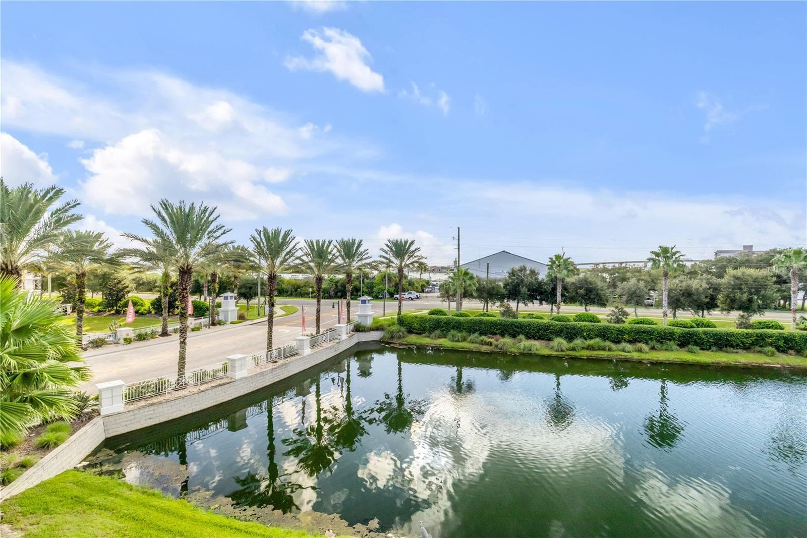 Back patio pond and Marina view - 1 RIVERWALK DR #303, NEW SMYRNA BEACH