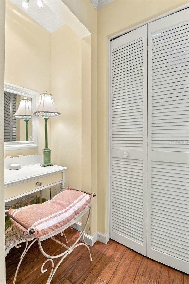 Cozy make-up/vanity space perfectly located adjacent from the en-suite bath~ - 1743 MACDONNELL DR, PALM HARBOR