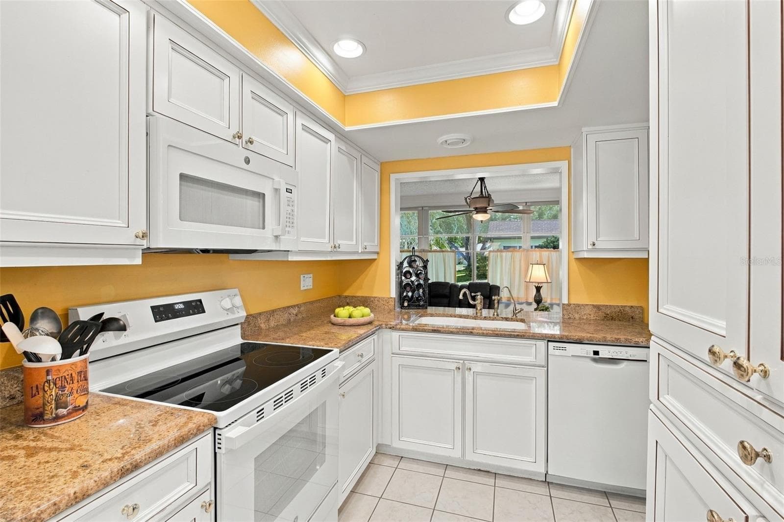 Beautiful granite countertops, newer appliances, & abundant cabinetry for stoarge~ - 1743 MACDONNELL DR, PALM HARBOR
