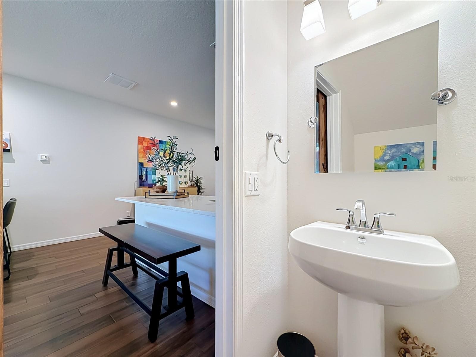 Downstairs Half Bath with custom barn door - 2270 MONTVIEW DR, CLEARWATER