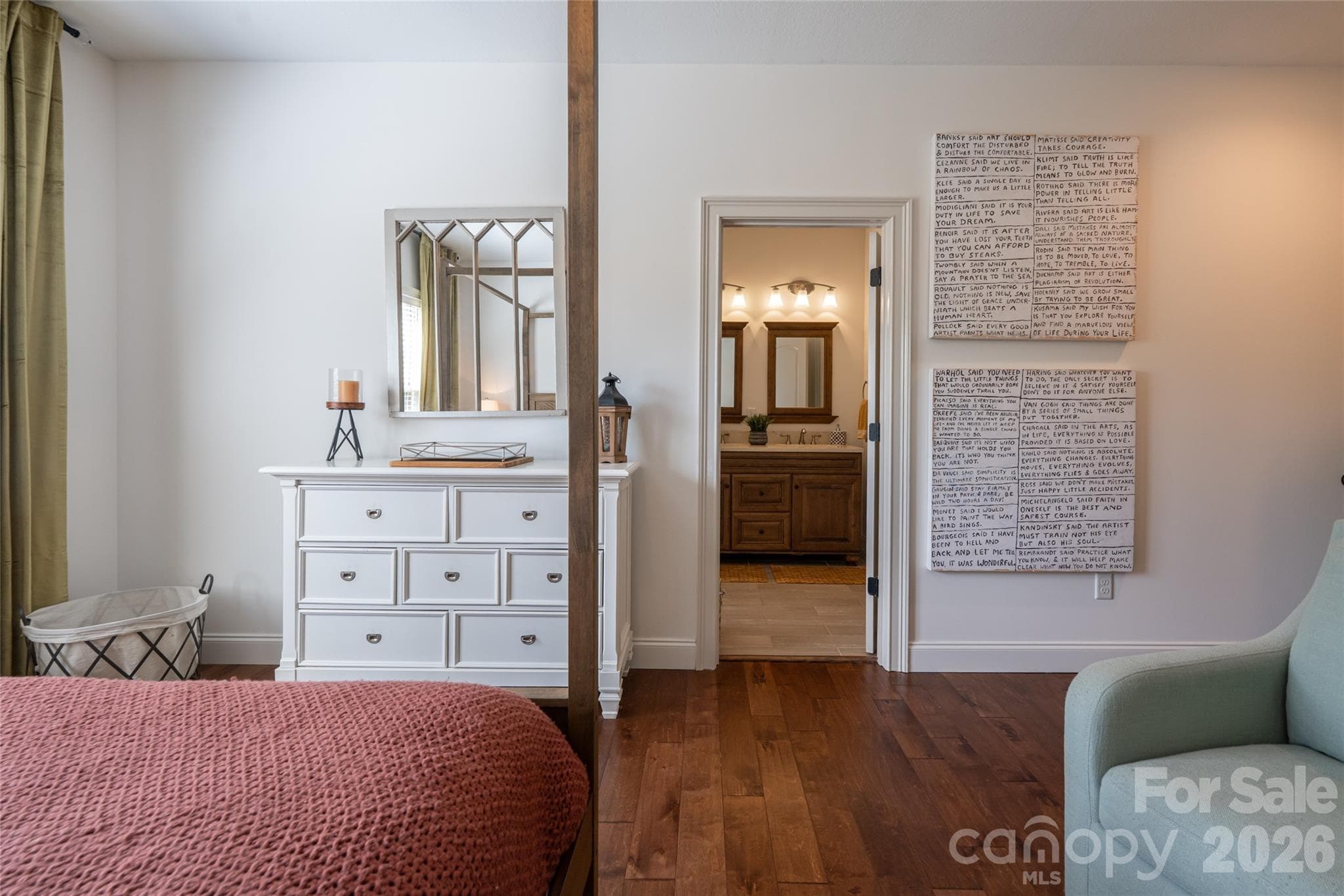 Primary suite dresser wall with walk-in closet and private en-suite bath beyond. - 17 Asher Lane, Arden