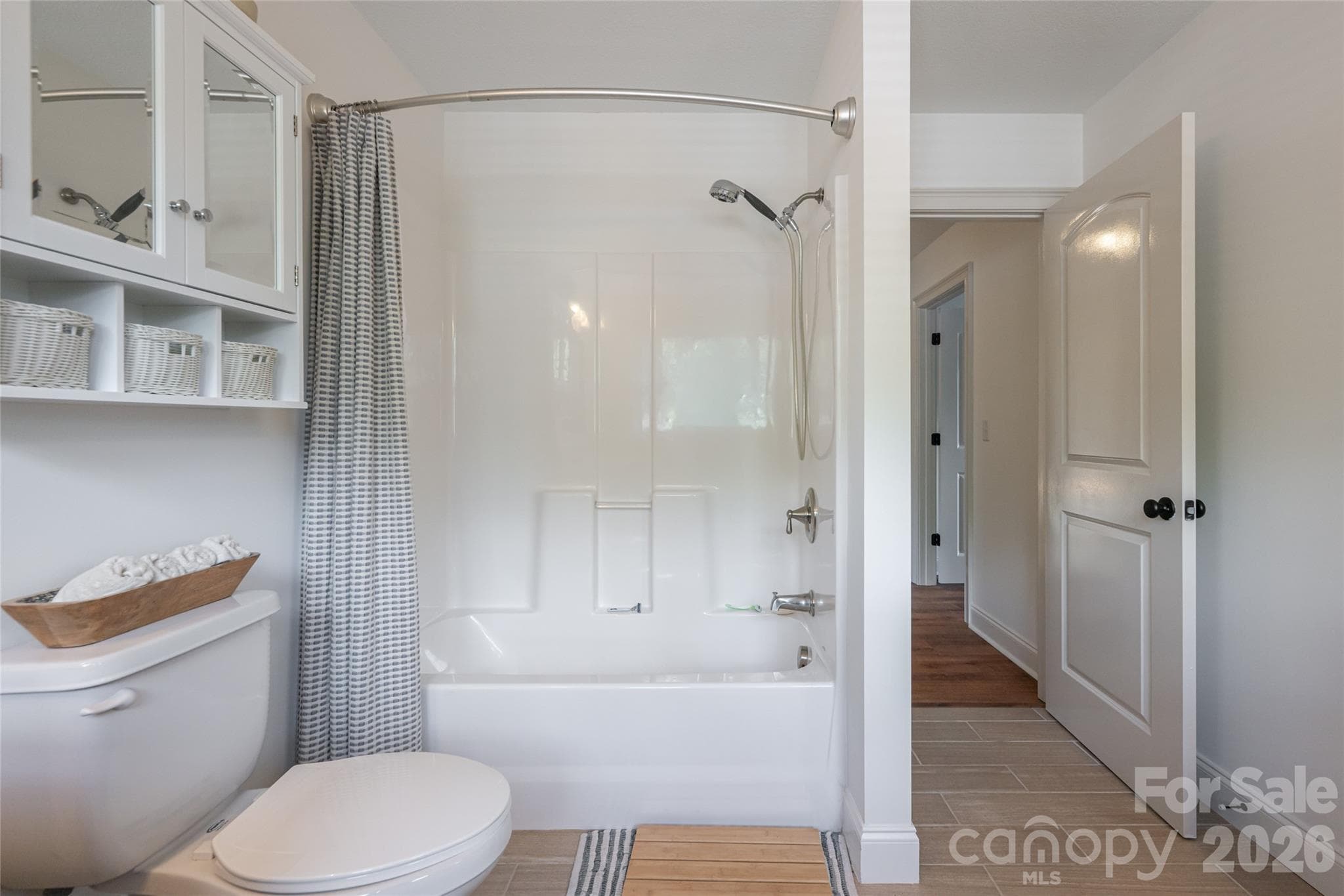 Upper bath tub-and-shower combination with built-in shelving. - 17 Asher Lane, Arden