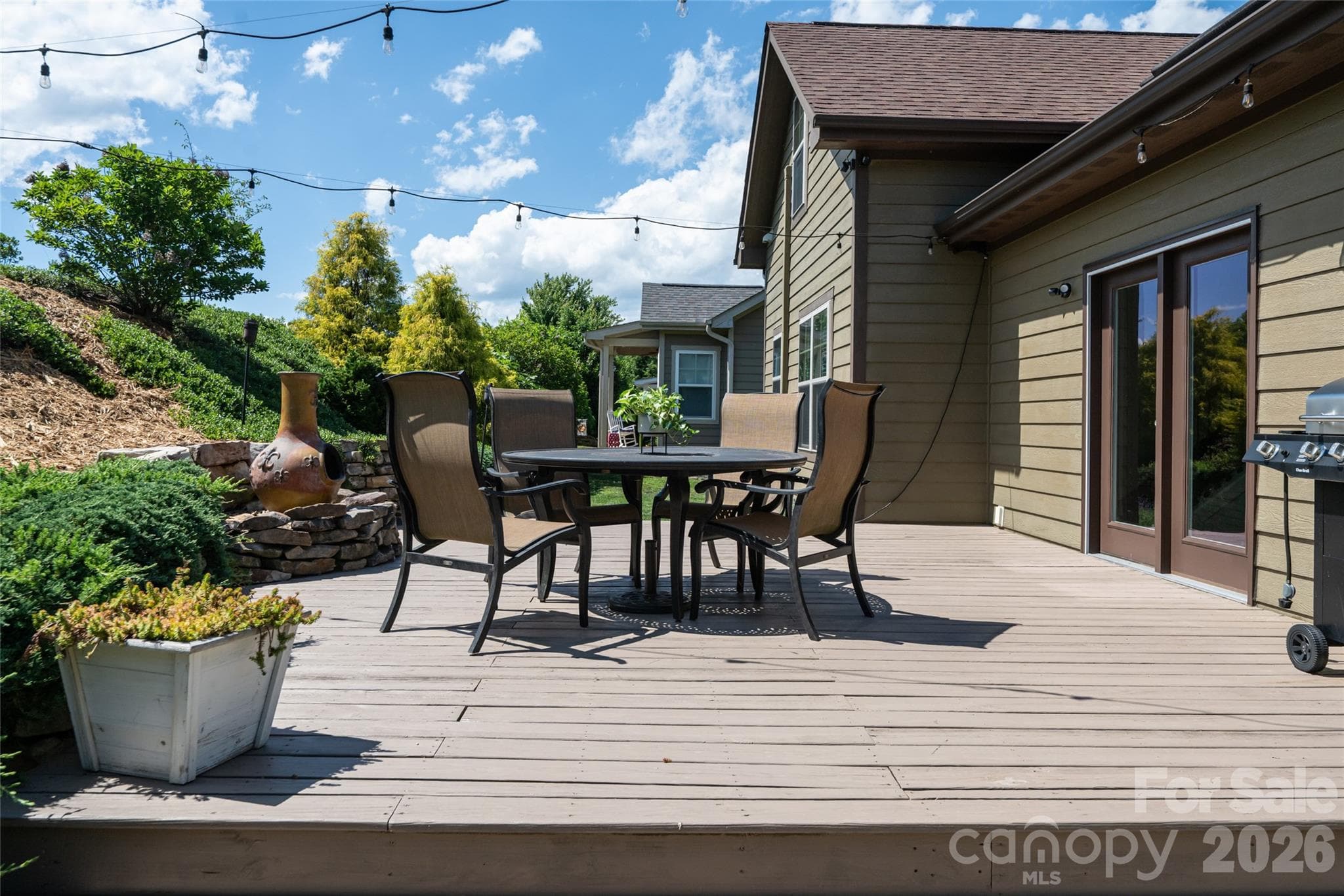 Rear deck off the main level with room for outdoor dining and grilling. - 17 Asher Lane, Arden