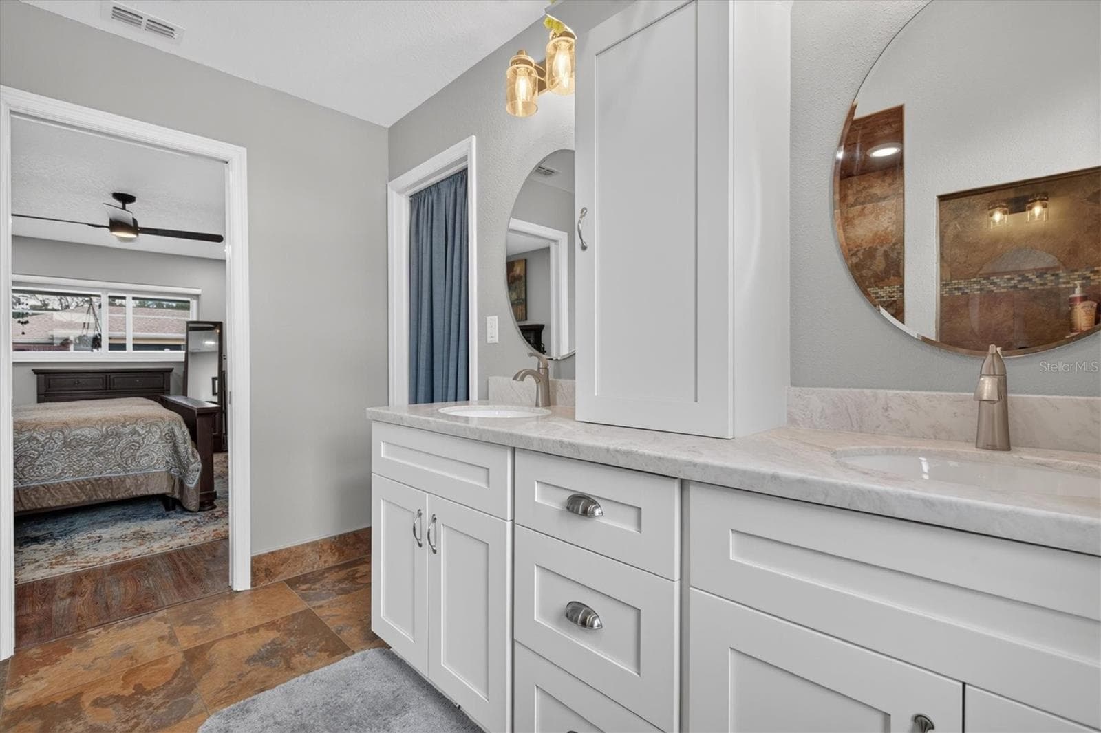 Primary Bedroom with white shaker cabinets - 8185 SPANISH OAK DR, SPRING HILL