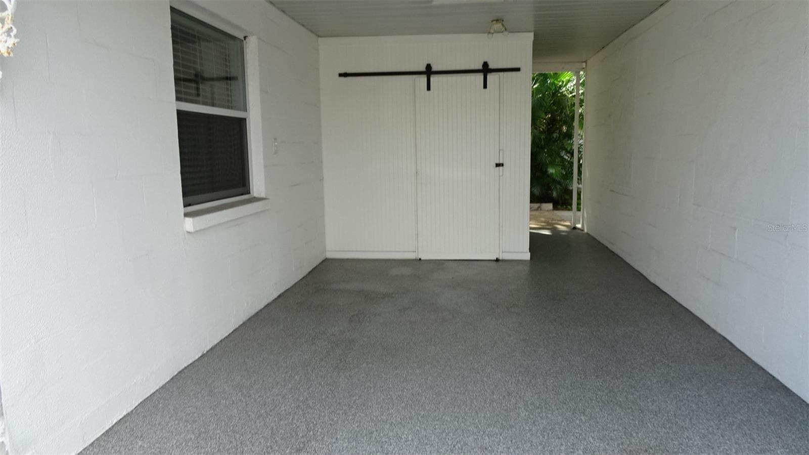 Private carport with storage. - 7800 38TH TER N, ST PETERSBURG