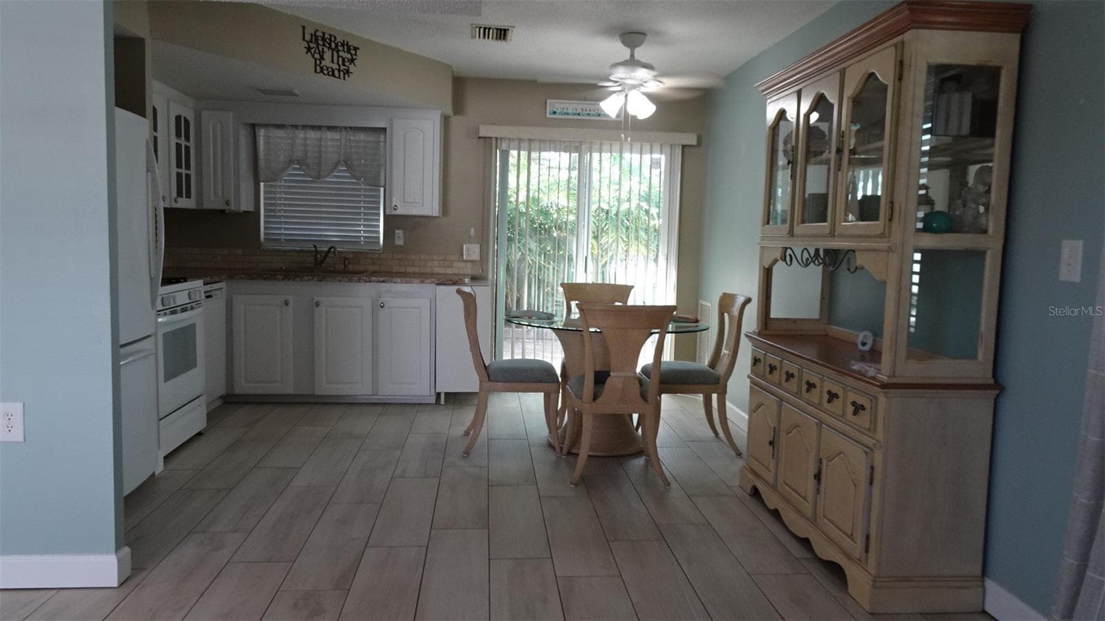 Eat in kitchen. Newer sliders. - 7800 38TH TER N, ST PETERSBURG