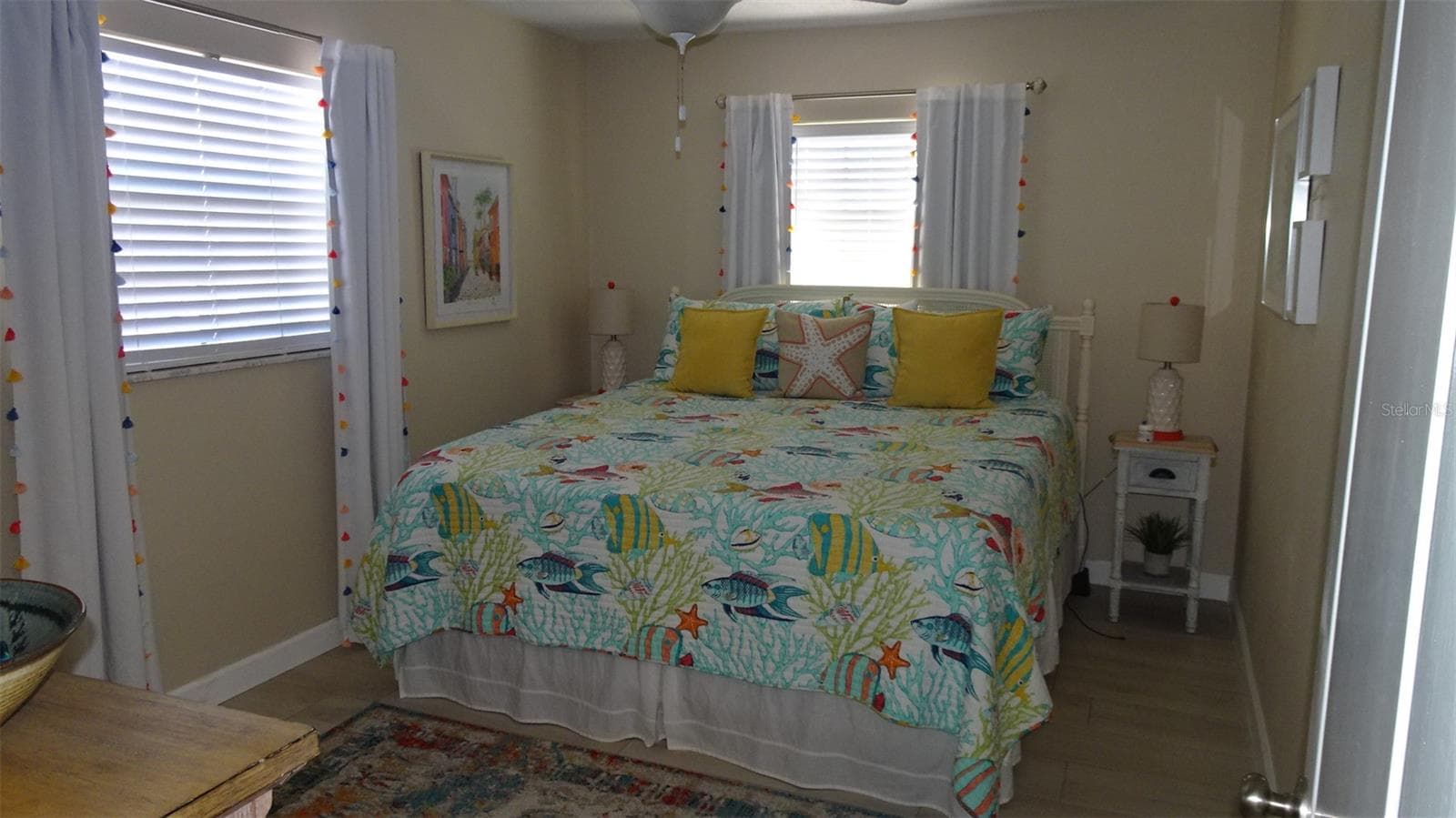 Front bedroom when furnished. - 7800 38TH TER N, ST PETERSBURG