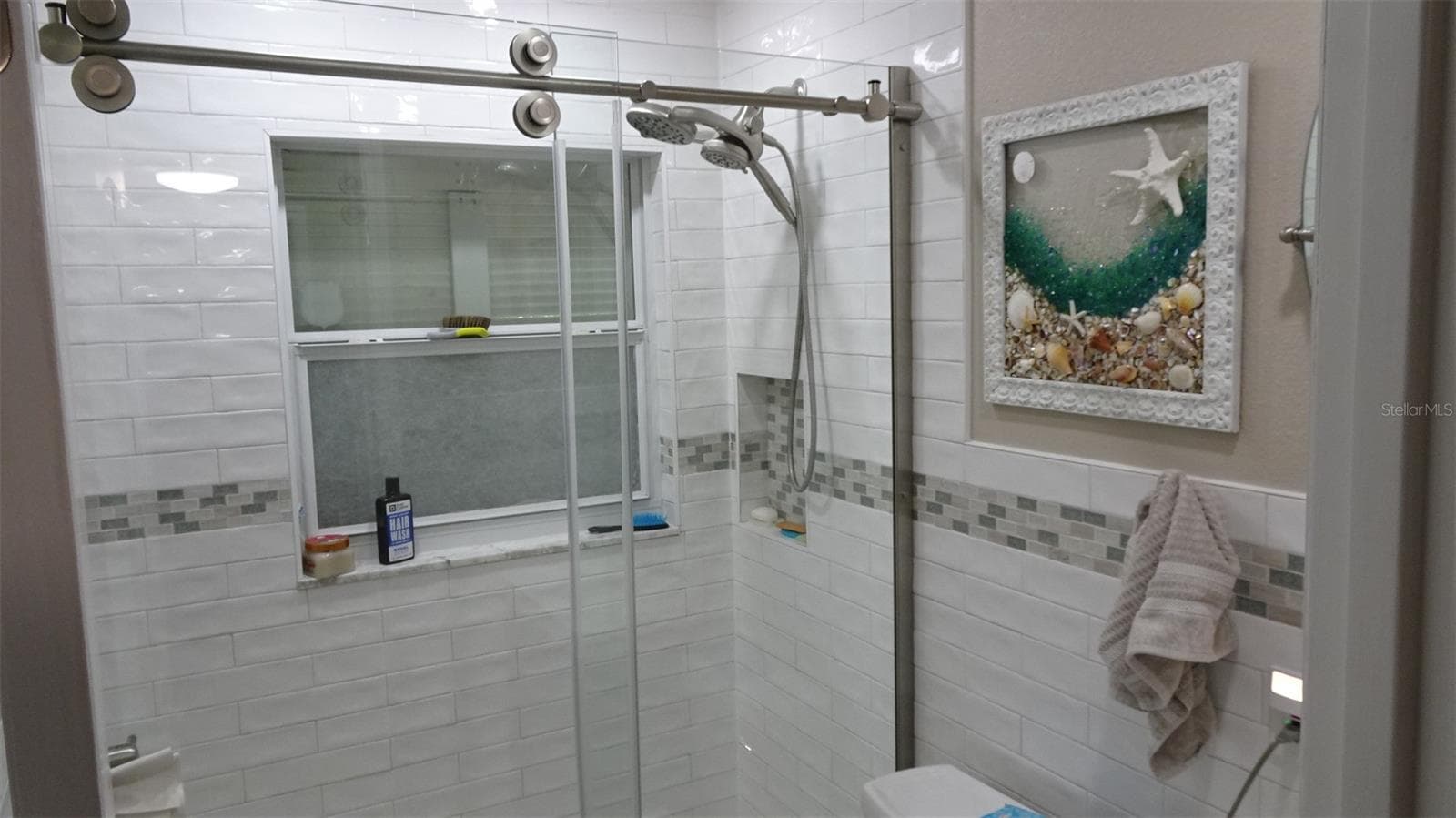 Hall bathroom fully remodeled. - 7800 38TH TER N, ST PETERSBURG