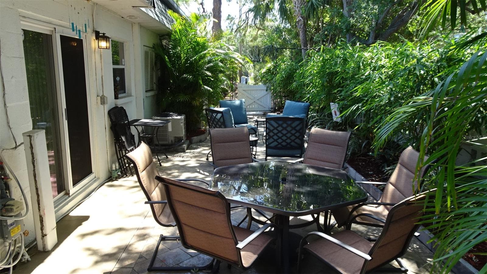 Sellers patio furniture for outdoor get togethers. - 7800 38TH TER N, ST PETERSBURG